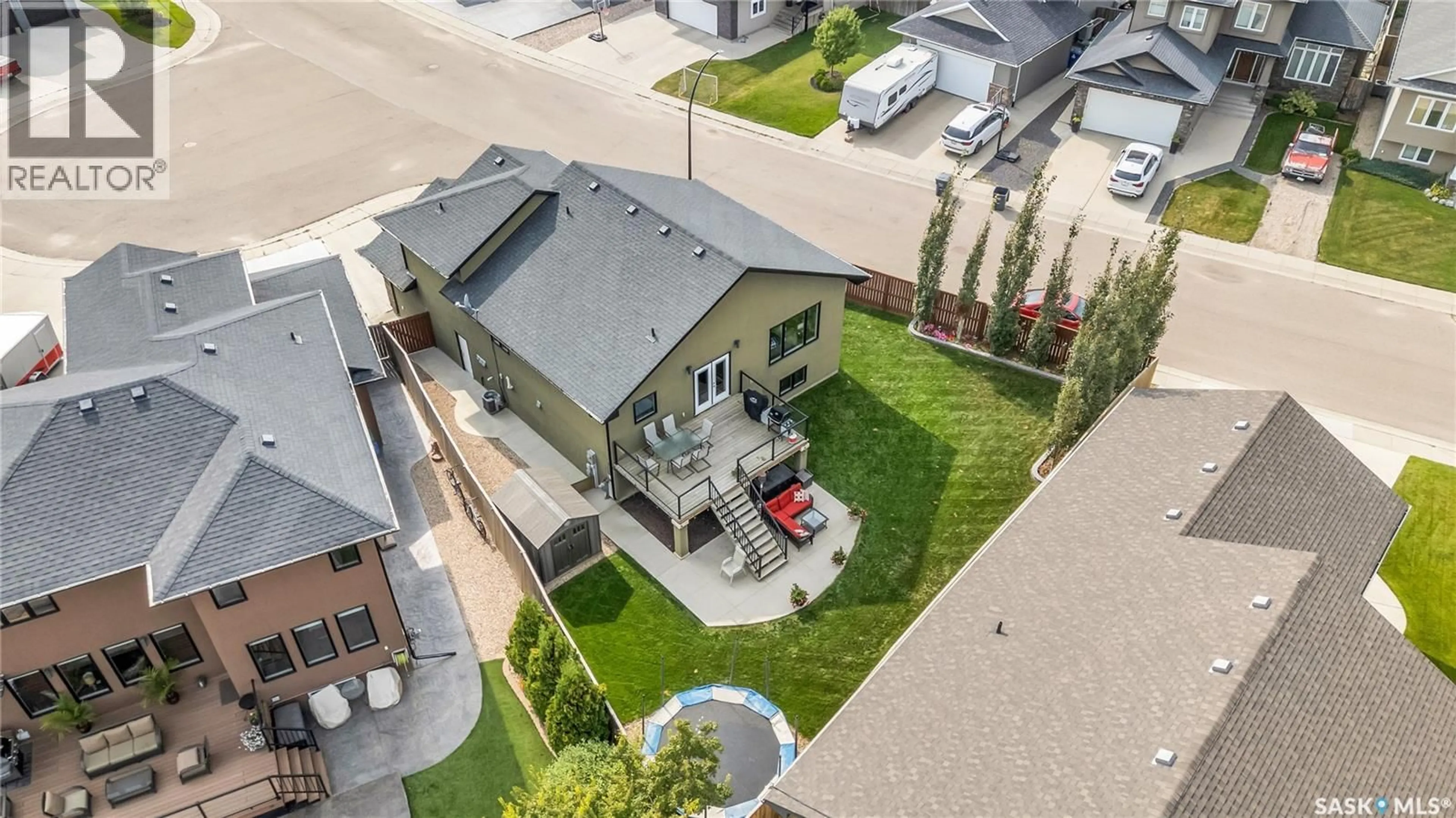 A pic from outside/outdoor area/front of a property/back of a property/a pic from drone, street for 227 STEFANIUK BAY, Saskatoon Saskatchewan S7W0H6