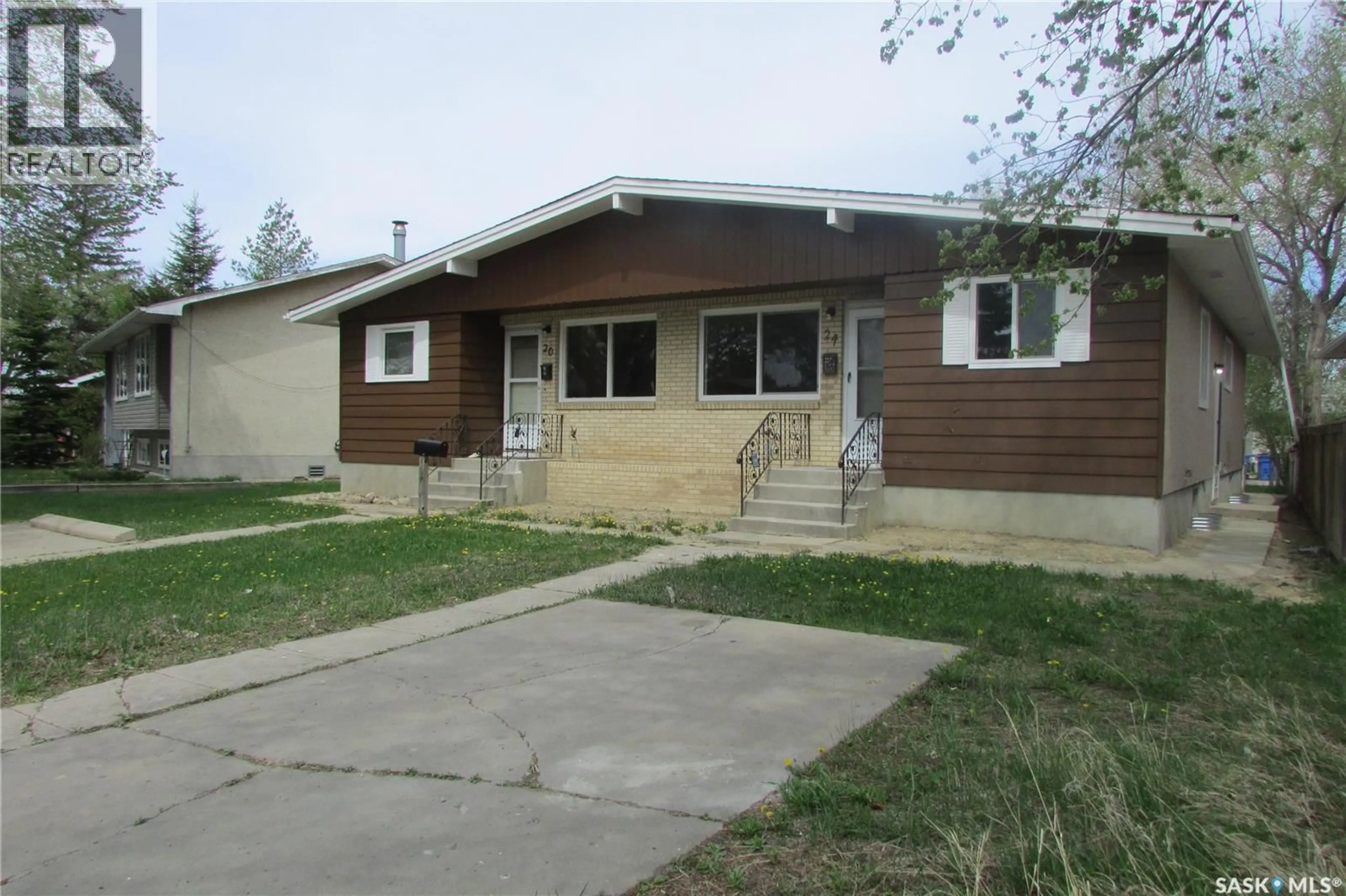 Home with vinyl exterior material, street for 20-24 EMPRESS DRIVE, Regina Saskatchewan S4T6M4