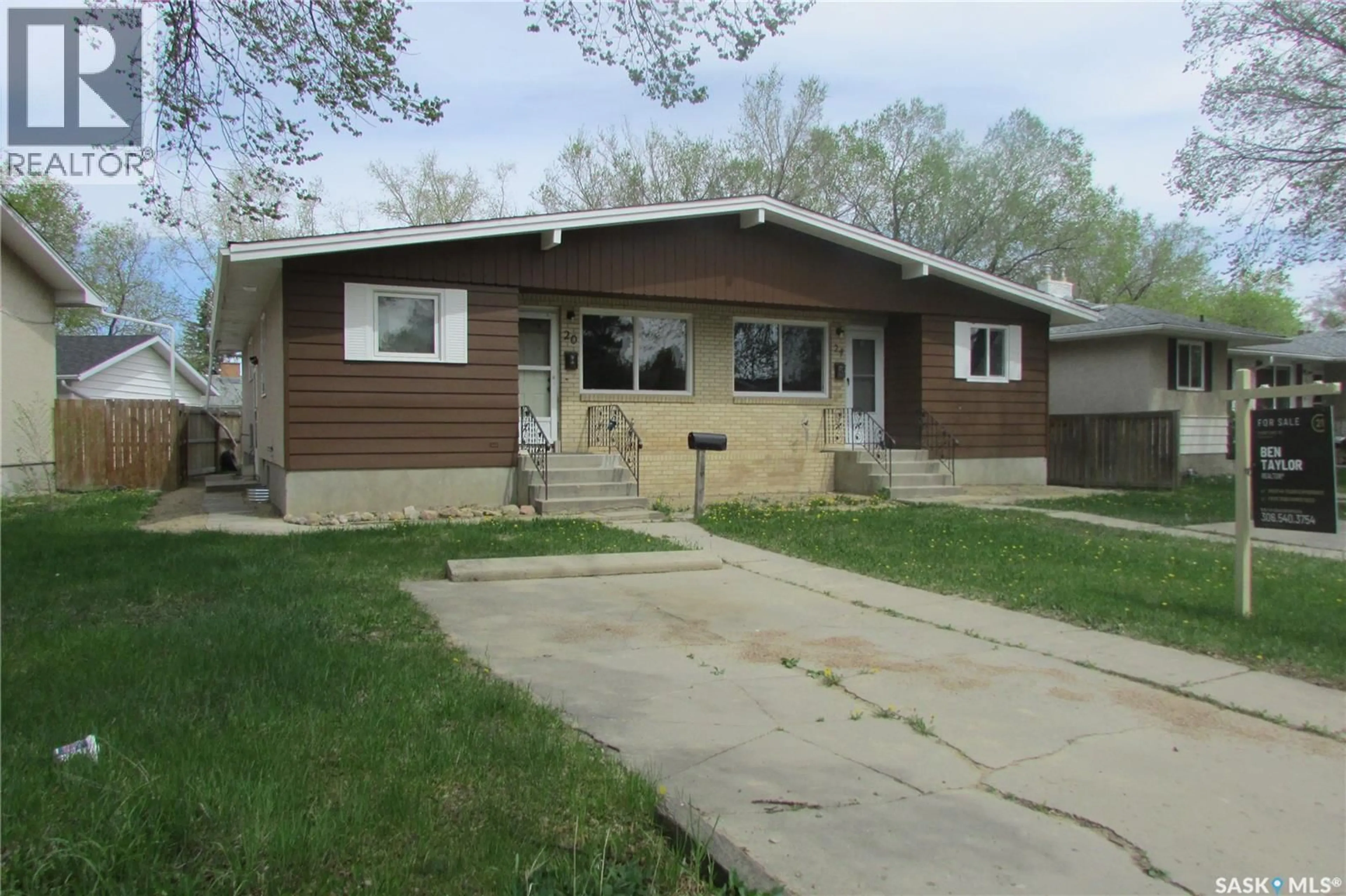 Home with vinyl exterior material, street for 20-24 EMPRESS DRIVE, Regina Saskatchewan S4T6M4