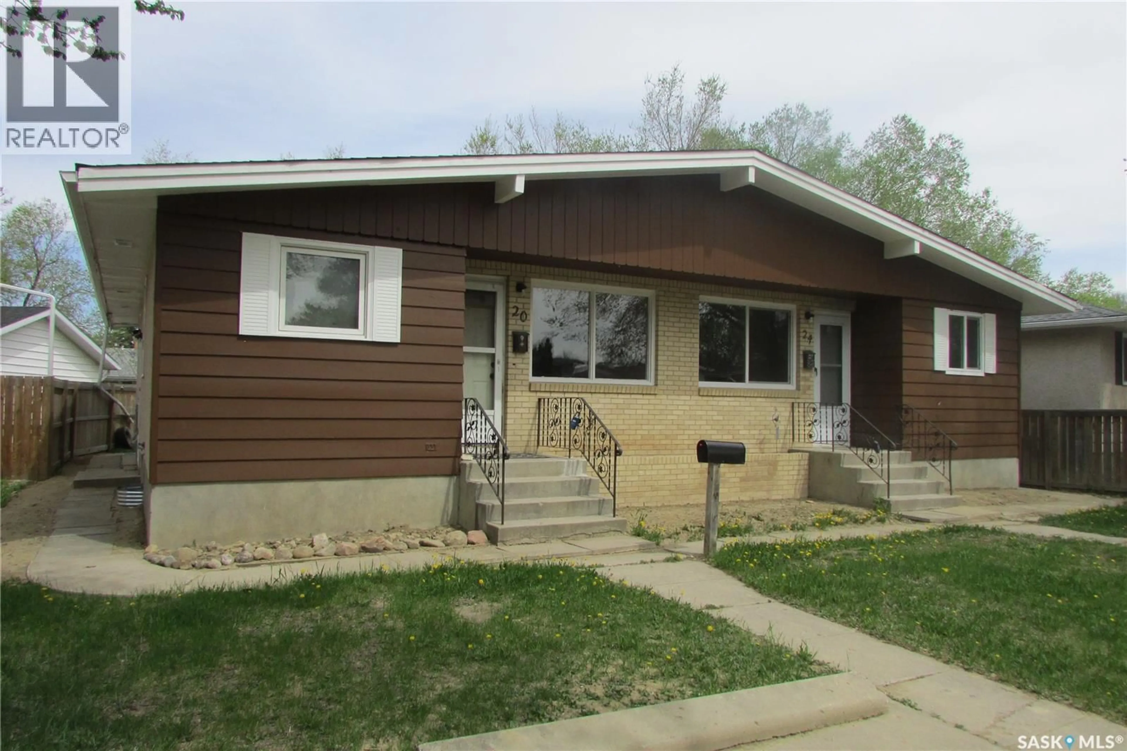 Home with vinyl exterior material, street for 20-24 EMPRESS DRIVE, Regina Saskatchewan S4T6M4