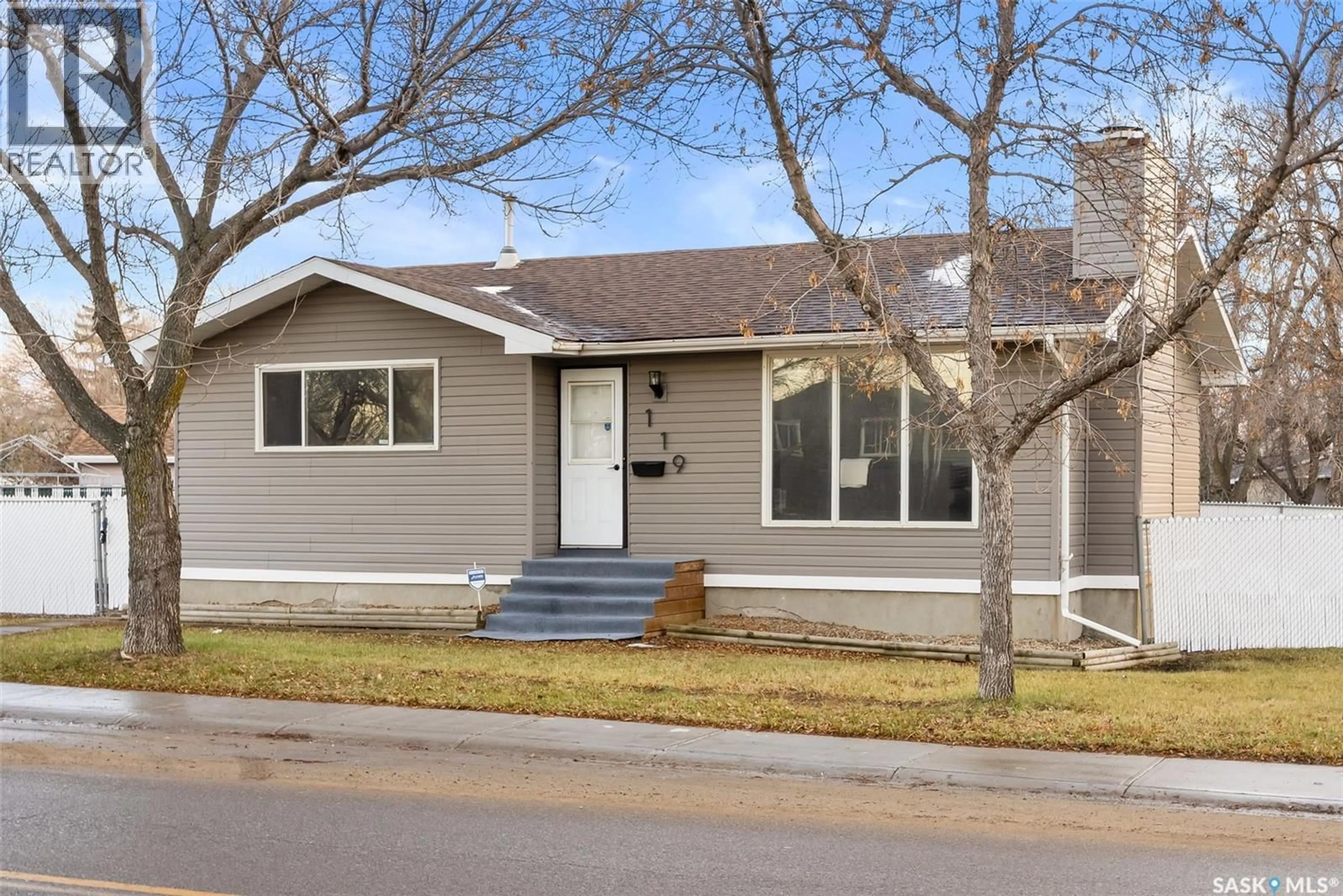 Home with vinyl exterior material, street for 119 MIKKELSON DRIVE, Regina Saskatchewan S4T7L4