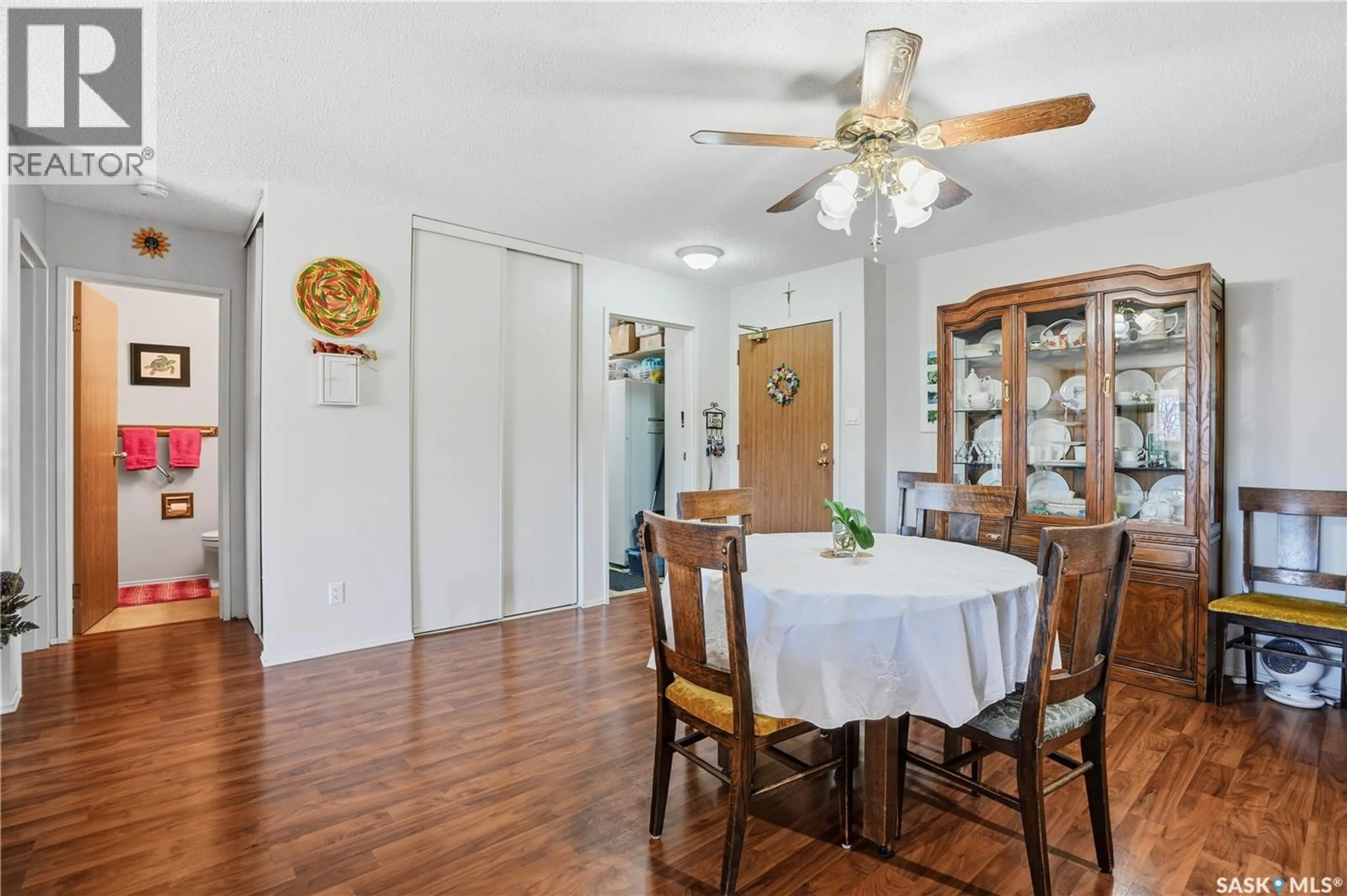 Dining room, wood/laminate floor for 209A - 306 CREE PLACE, Saskatoon Saskatchewan S7K7Z3