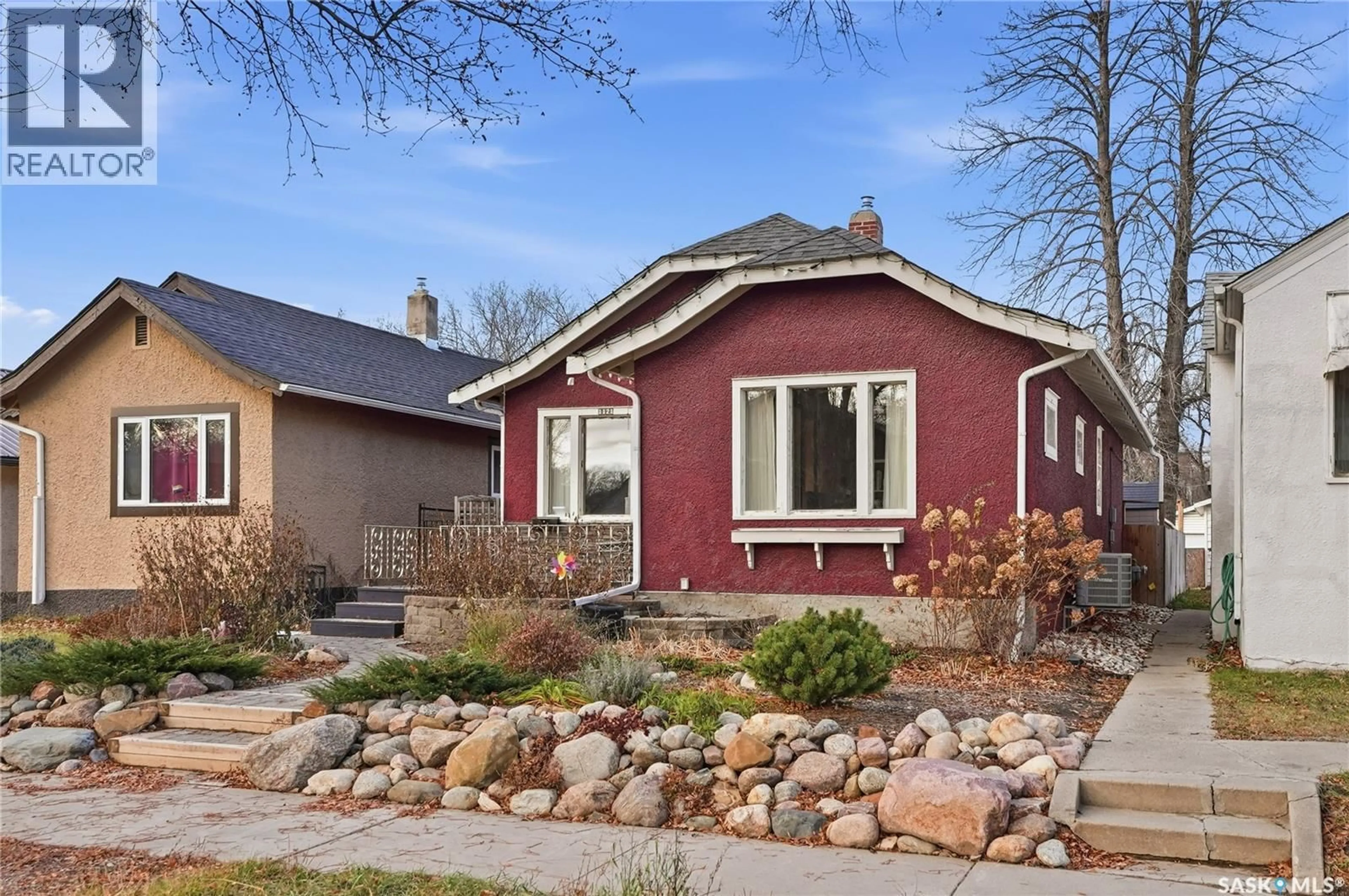 Home with brick exterior material, street for 1121 C AVENUE, Saskatoon Saskatchewan S7L1K3