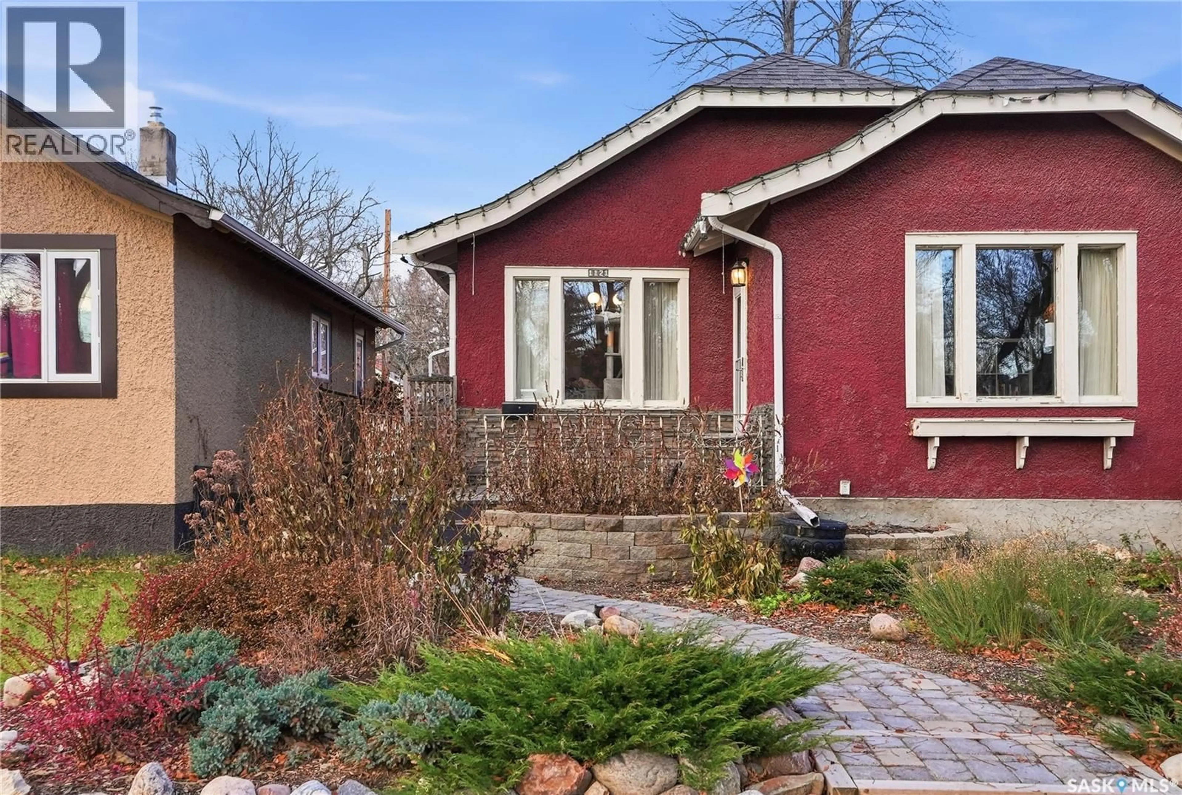 Home with brick exterior material, street for 1121 C AVENUE, Saskatoon Saskatchewan S7L1K3