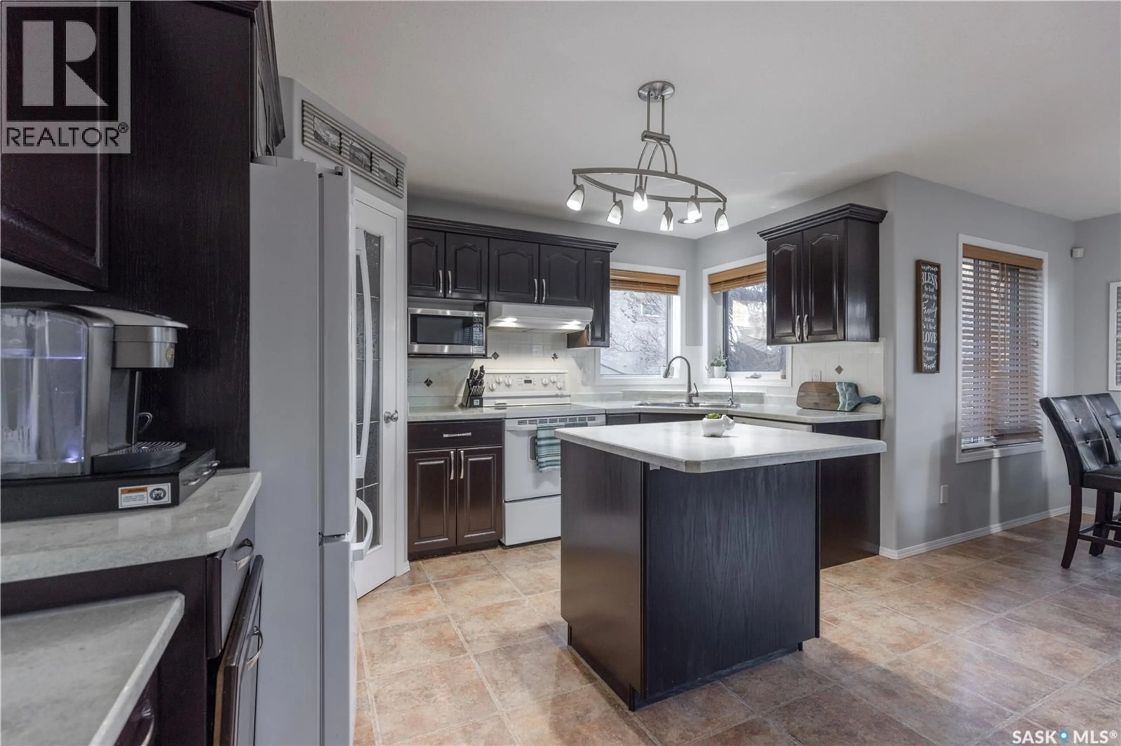 Open concept kitchen, ceramic/tile floor for 227 OVERHOLT PLACE, Saskatoon Saskatchewan S7N4S9