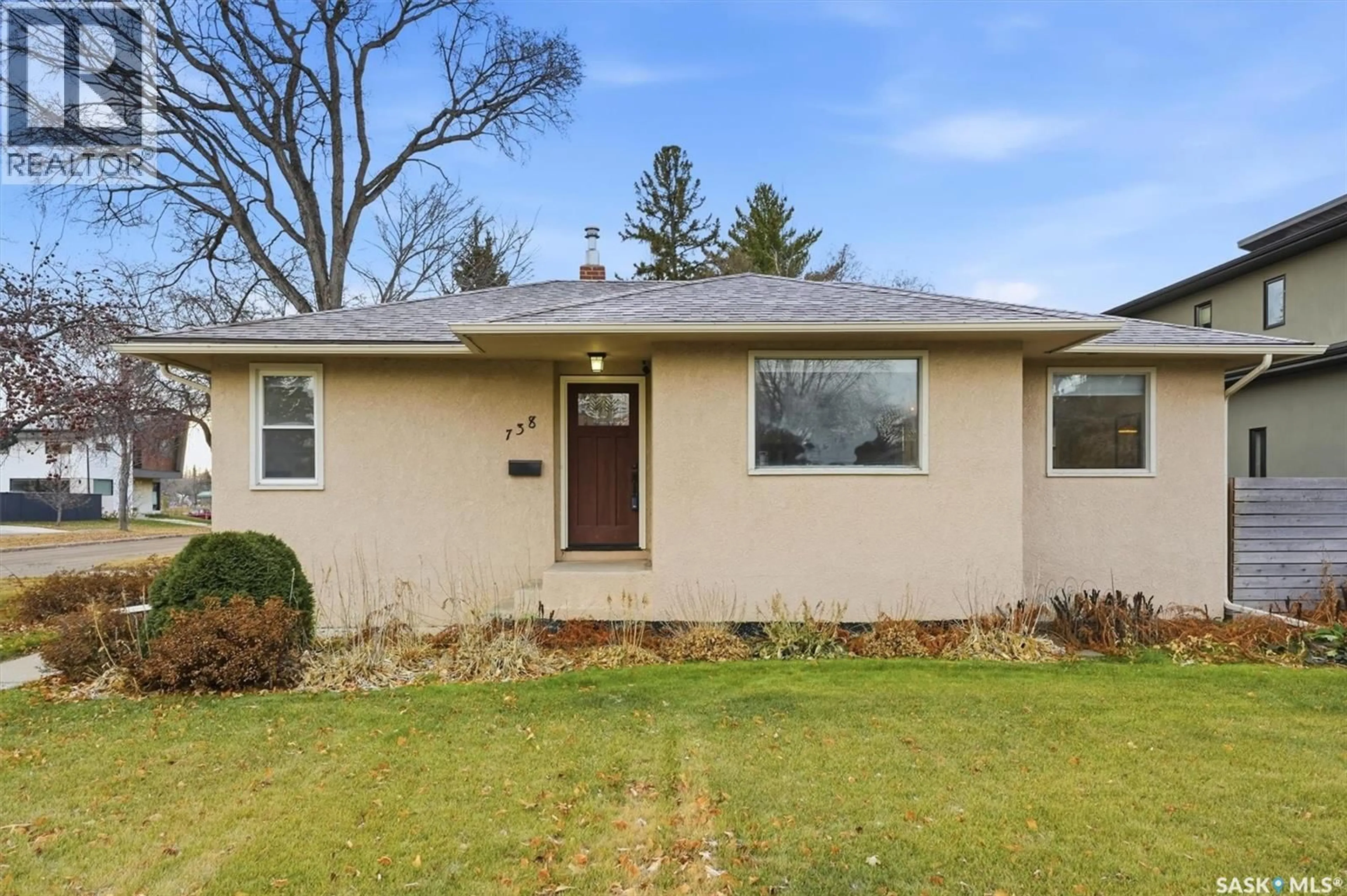 Home with vinyl exterior material, street for 738 3RD STREET E, Saskatoon Saskatchewan S7H1M3