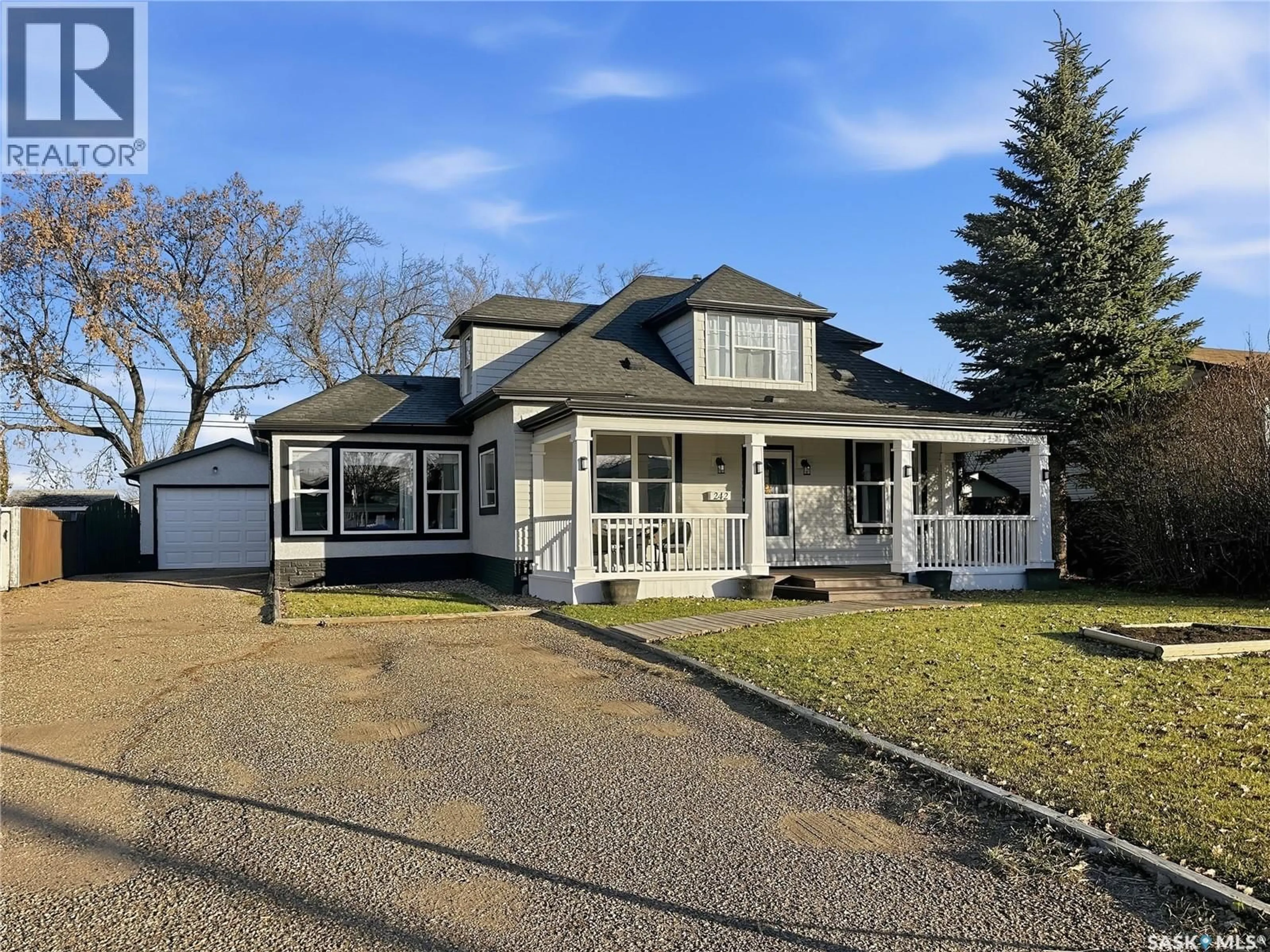 Home with vinyl exterior material, street for 242 30TH STREET, Battleford Saskatchewan S0M0E0