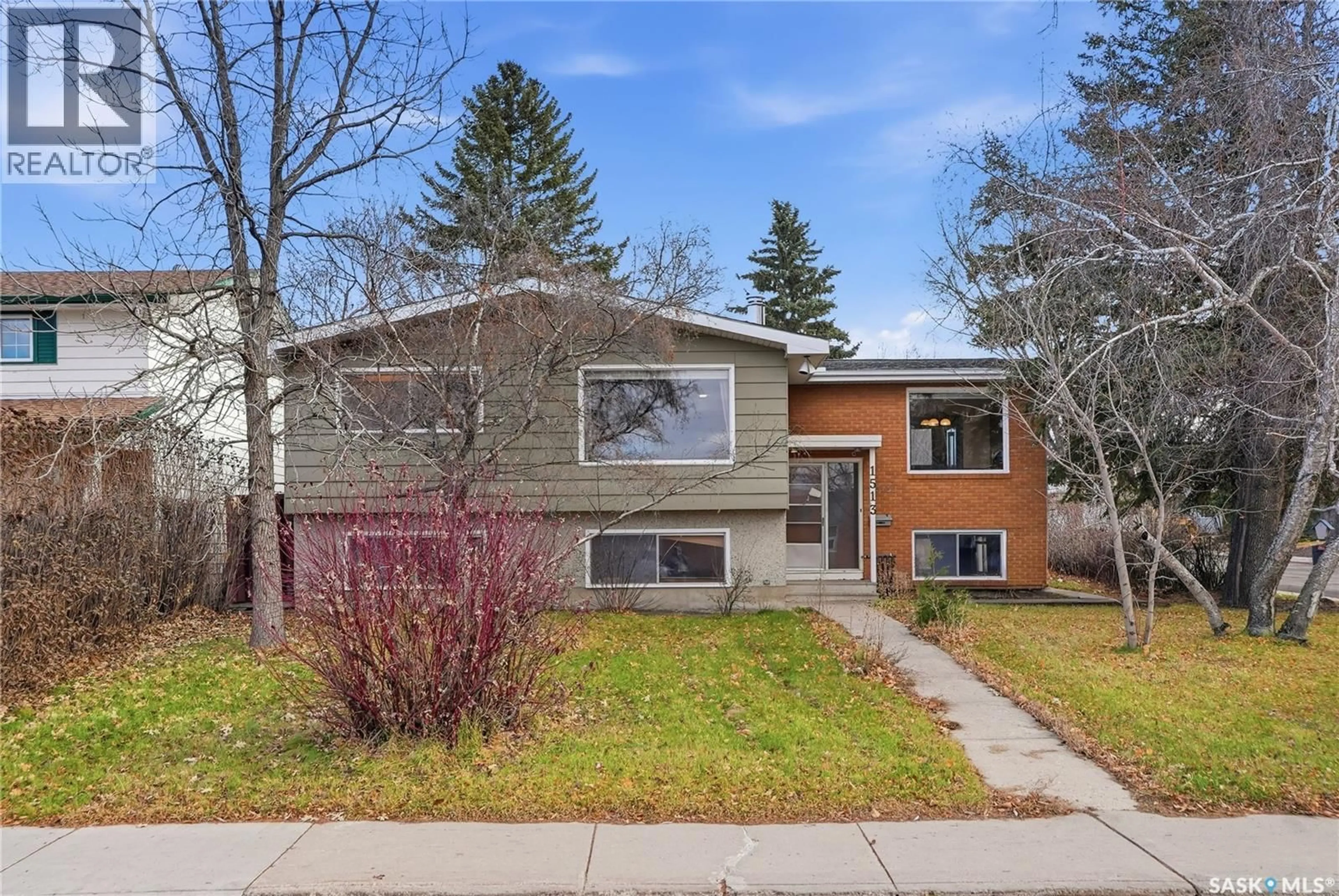 Home with brick exterior material, street for 1513 ARLINGTON AVENUE, Saskatoon Saskatchewan S7H2Y3