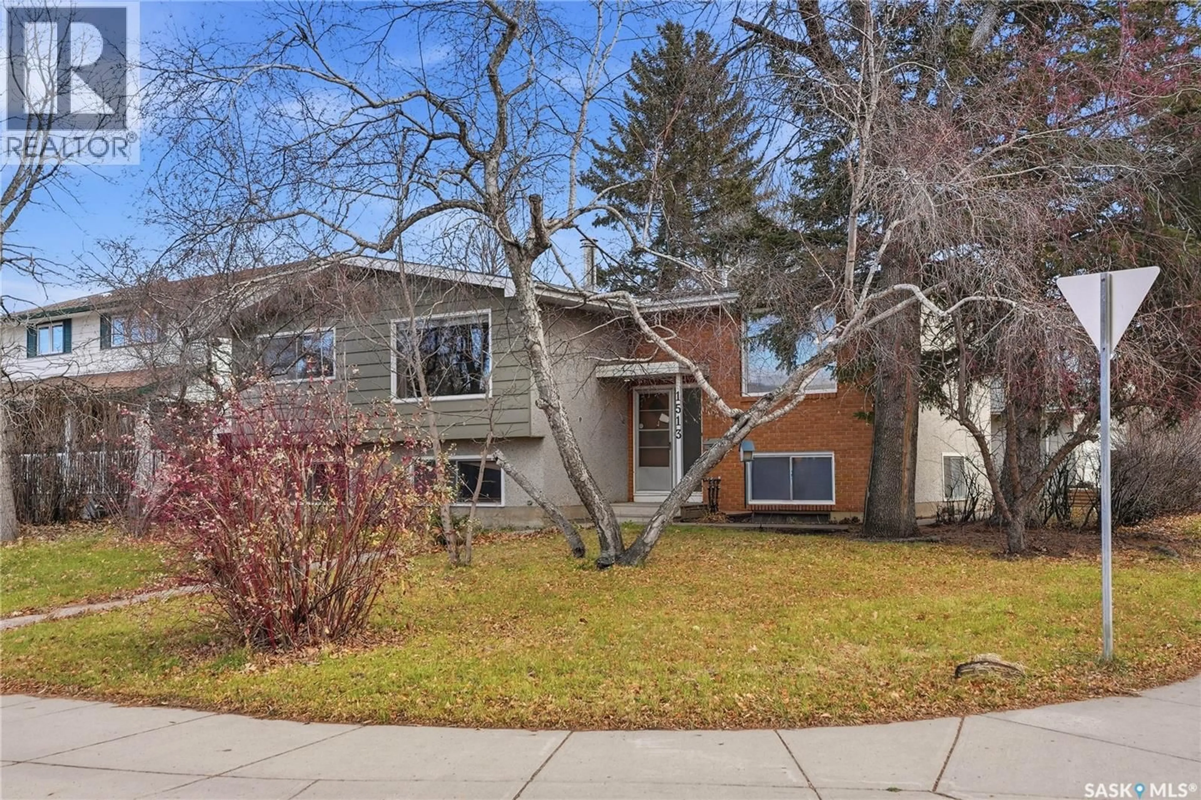Home with brick exterior material, street for 1513 ARLINGTON AVENUE, Saskatoon Saskatchewan S7H2Y3