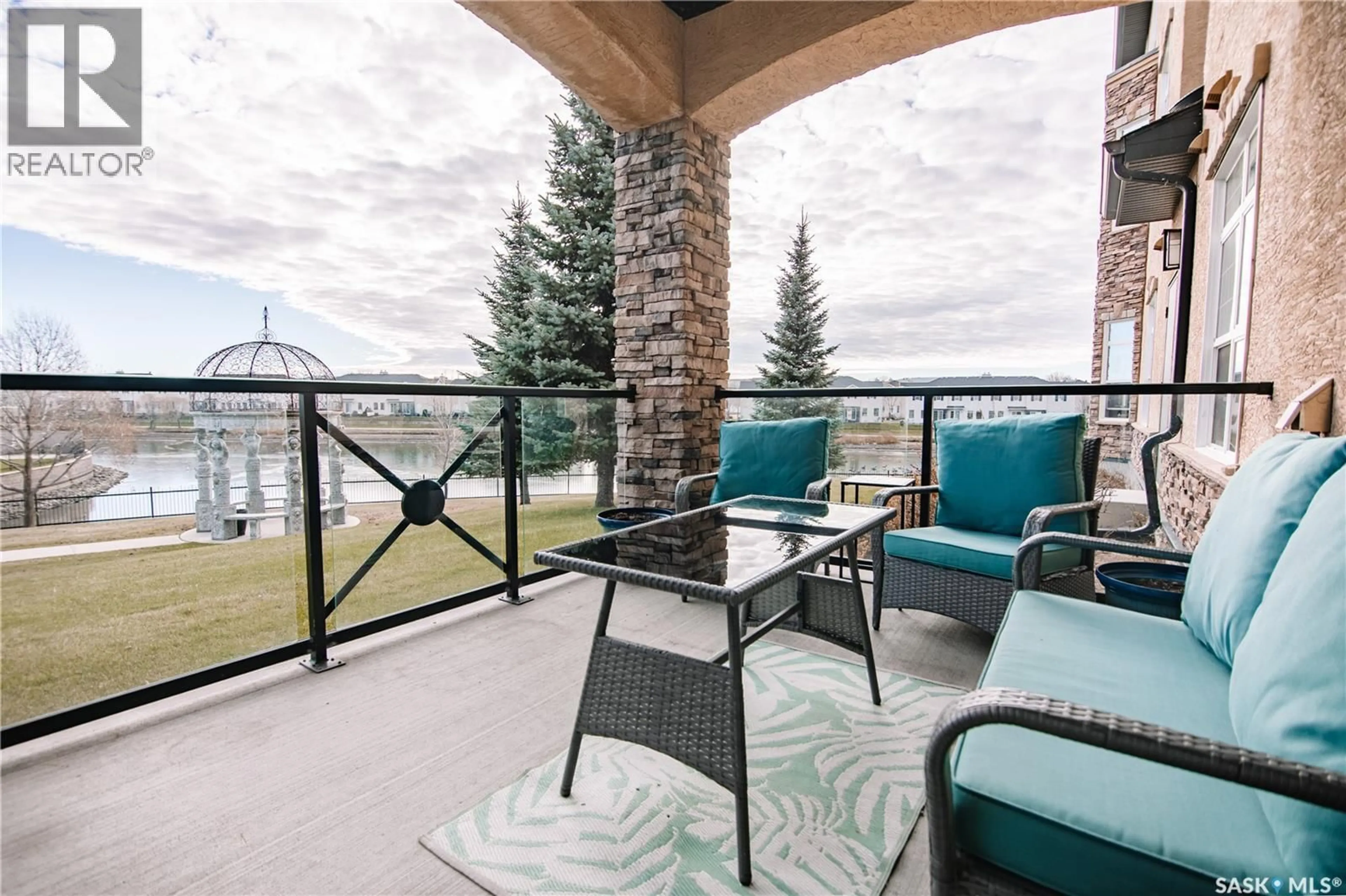 Patio, water/lake/river/ocean view for 104 2150 HESELTINE ROAD, Regina Saskatchewan S4V1K9