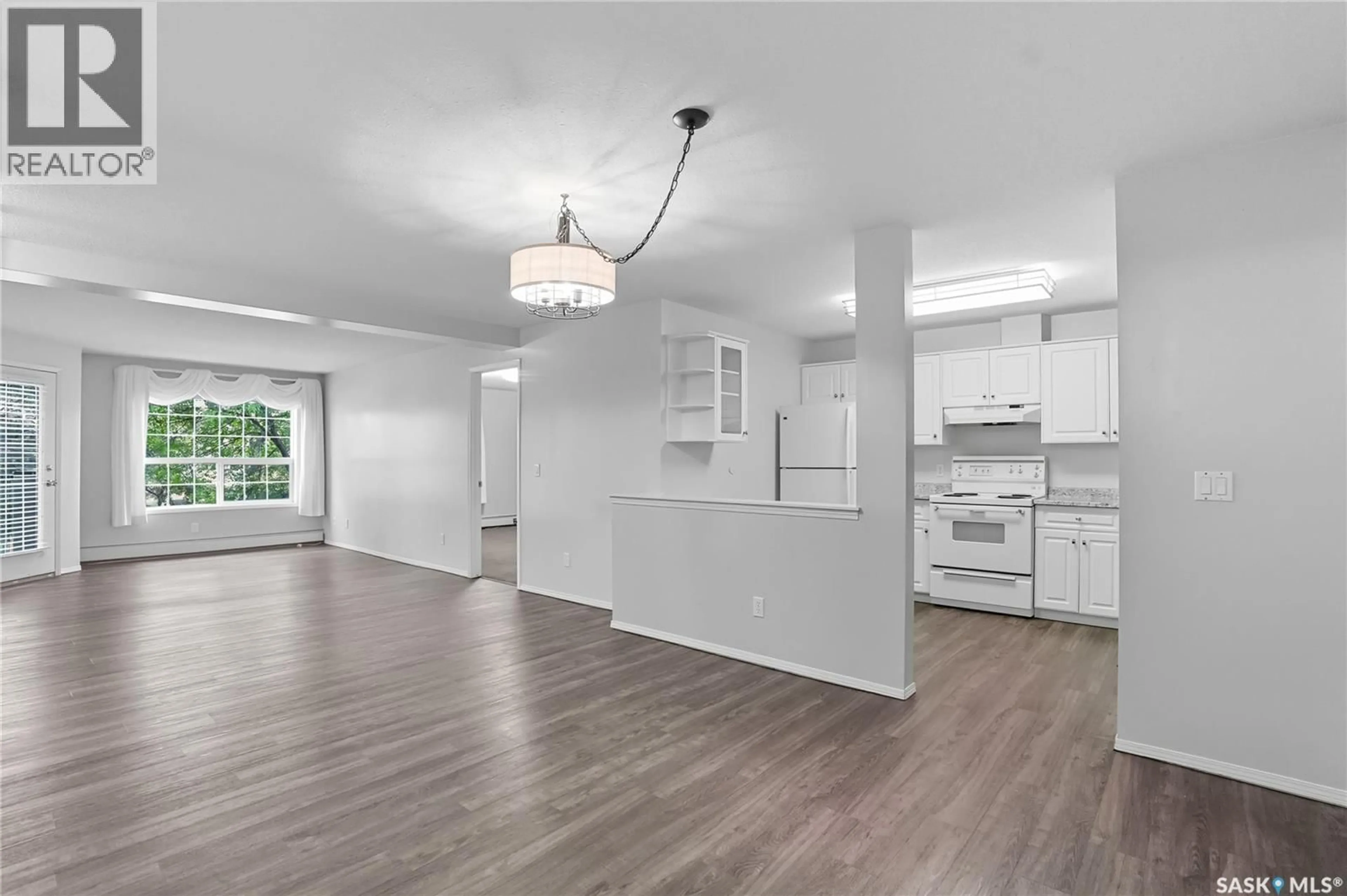 Open concept kitchen, unknown for 211 1735 MCKERCHER DRIVE, Saskatoon Saskatchewan S7H5N6