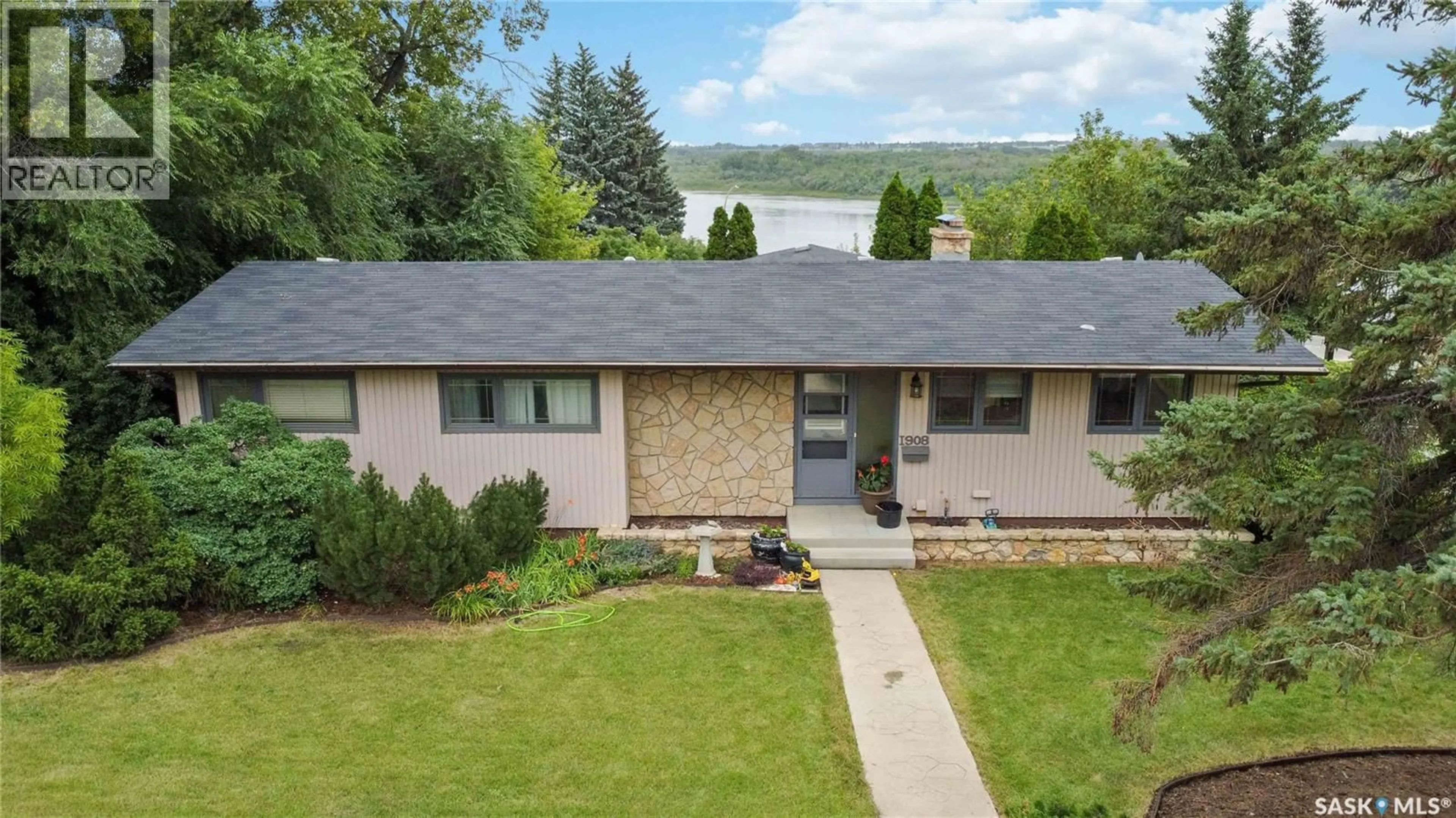 A pic from outside/outdoor area/front of a property/back of a property/a pic from drone, water/lake/river/ocean view for 1908 PEMBINA AVENUE, Saskatoon Saskatchewan S7K1C3