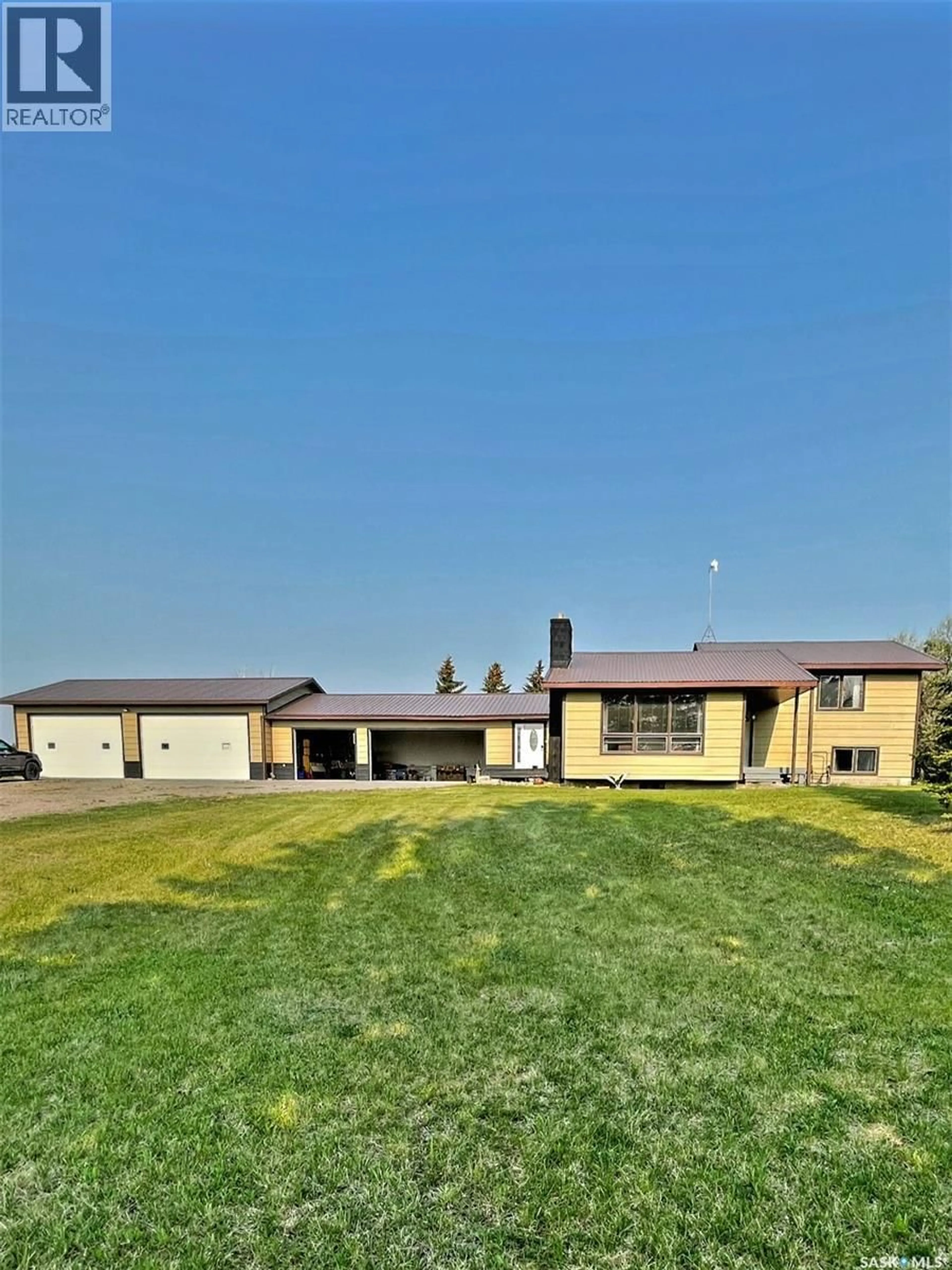 A pic from outside/outdoor area/front of a property/back of a property/a pic from drone, unknown for REGINA COMMUTER ACREAGE, Edenwold Rm No.158 Saskatchewan S4L5B1