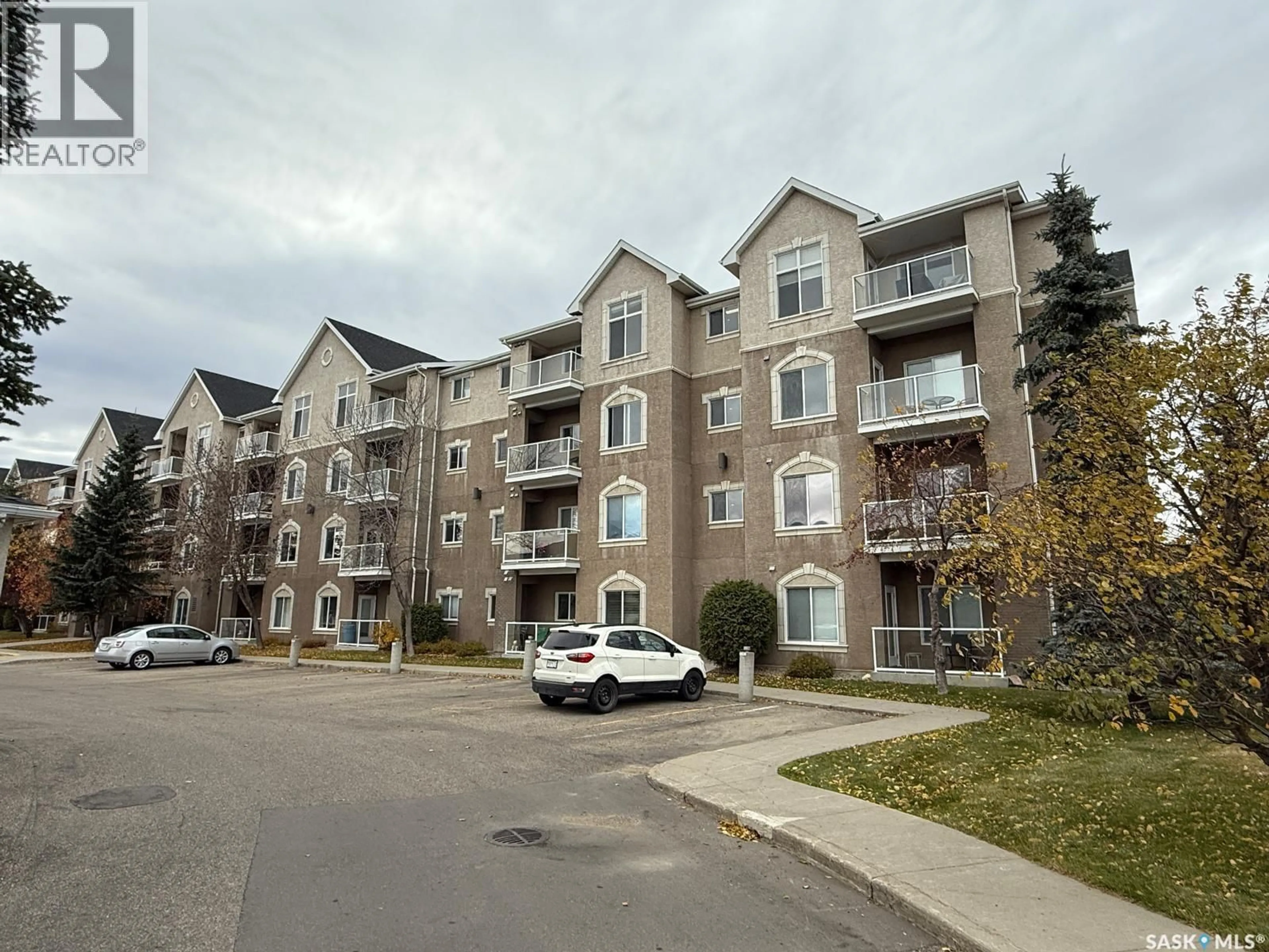 A pic from outside/outdoor area/front of a property/back of a property/a pic from drone, unknown for 216 235 HEROLD TERRACE, Saskatoon Saskatchewan S7V1J2