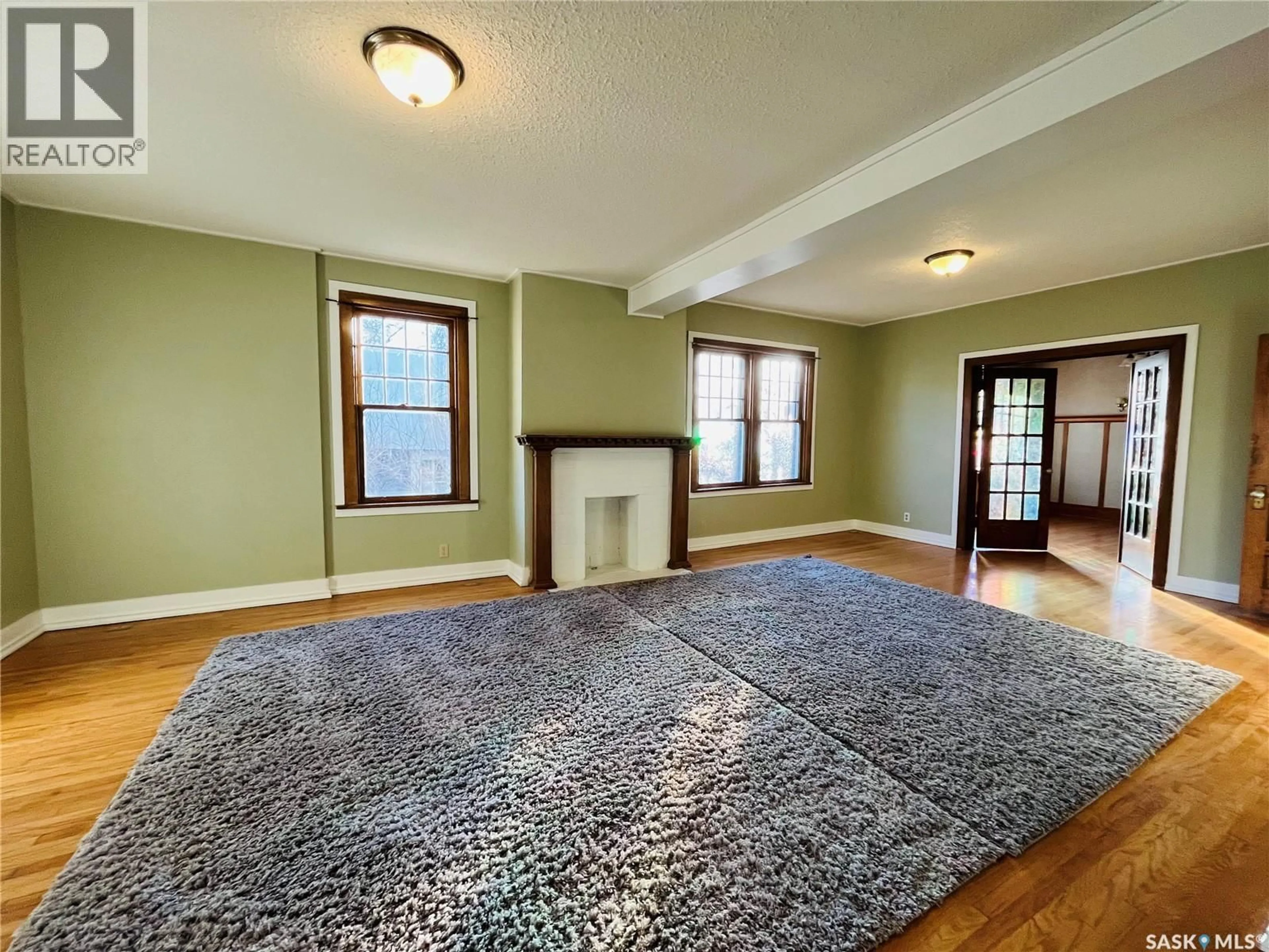 Living room with furniture, carpet floor for 456 3RD AVENUE, Swift Current Saskatchewan S9H2H2