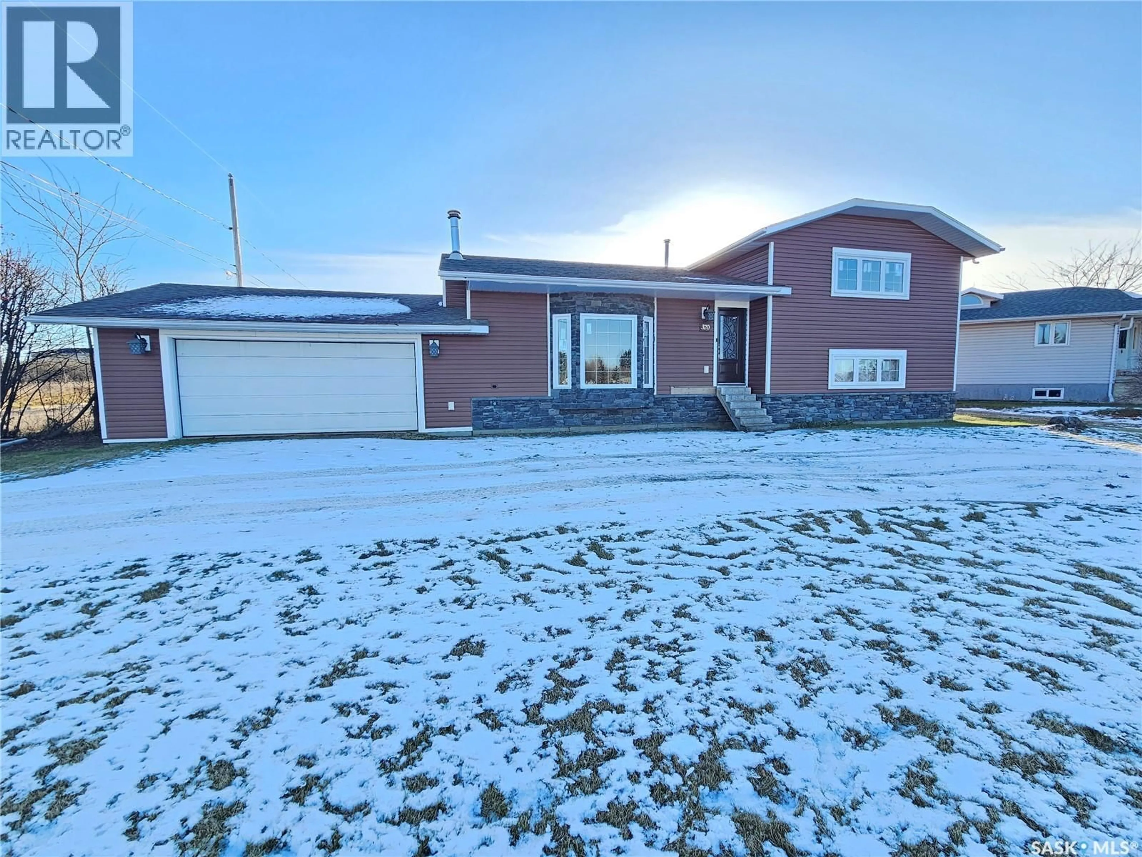 A pic from outside/outdoor area/front of a property/back of a property/a pic from drone, street for 320 9TH AVENUE, Meadow Lake Saskatchewan S9X1H1