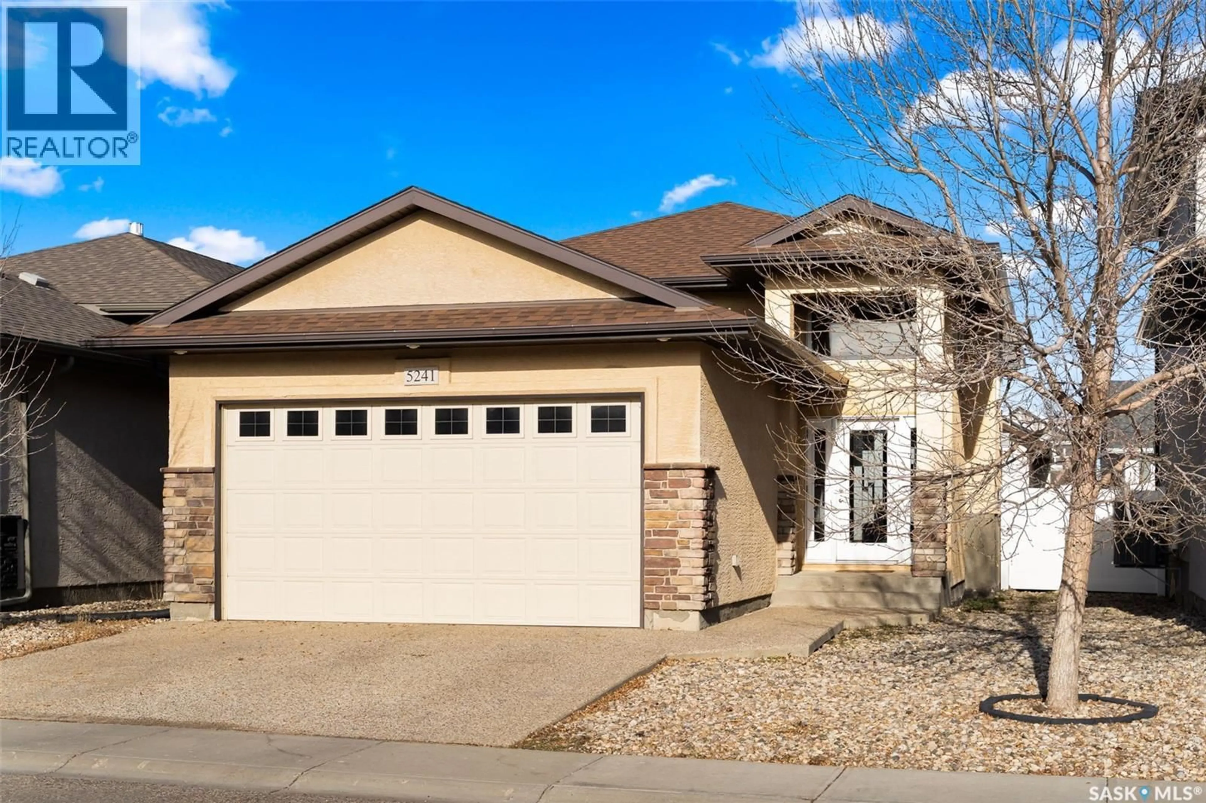 Home with vinyl exterior material, street for 5241 AERIAL CRESCENT, Regina Saskatchewan S4W0C8