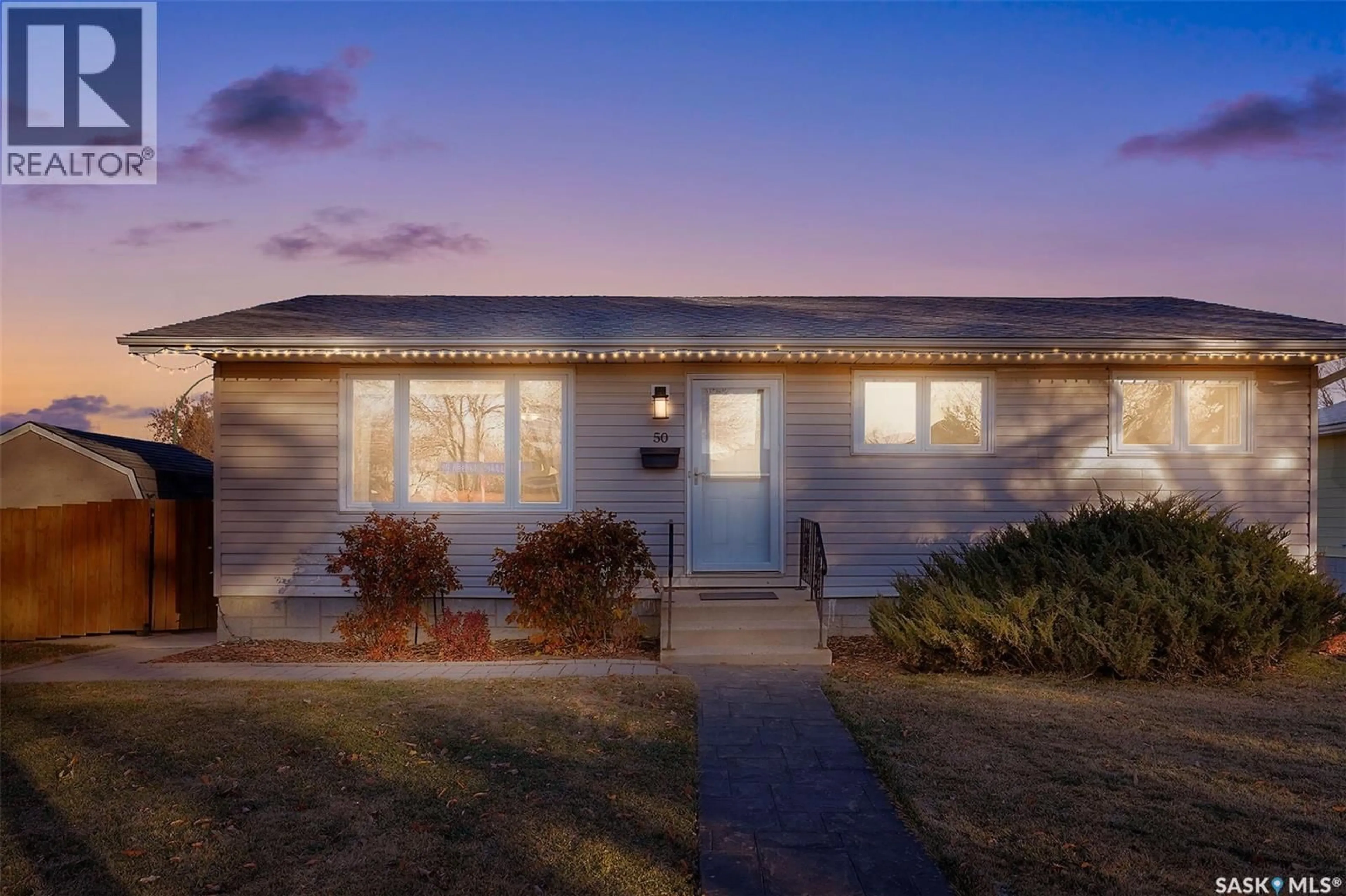 Home with vinyl exterior material, street for 50 NEWSTEAD AVENUE, Regina Saskatchewan S4X1H2