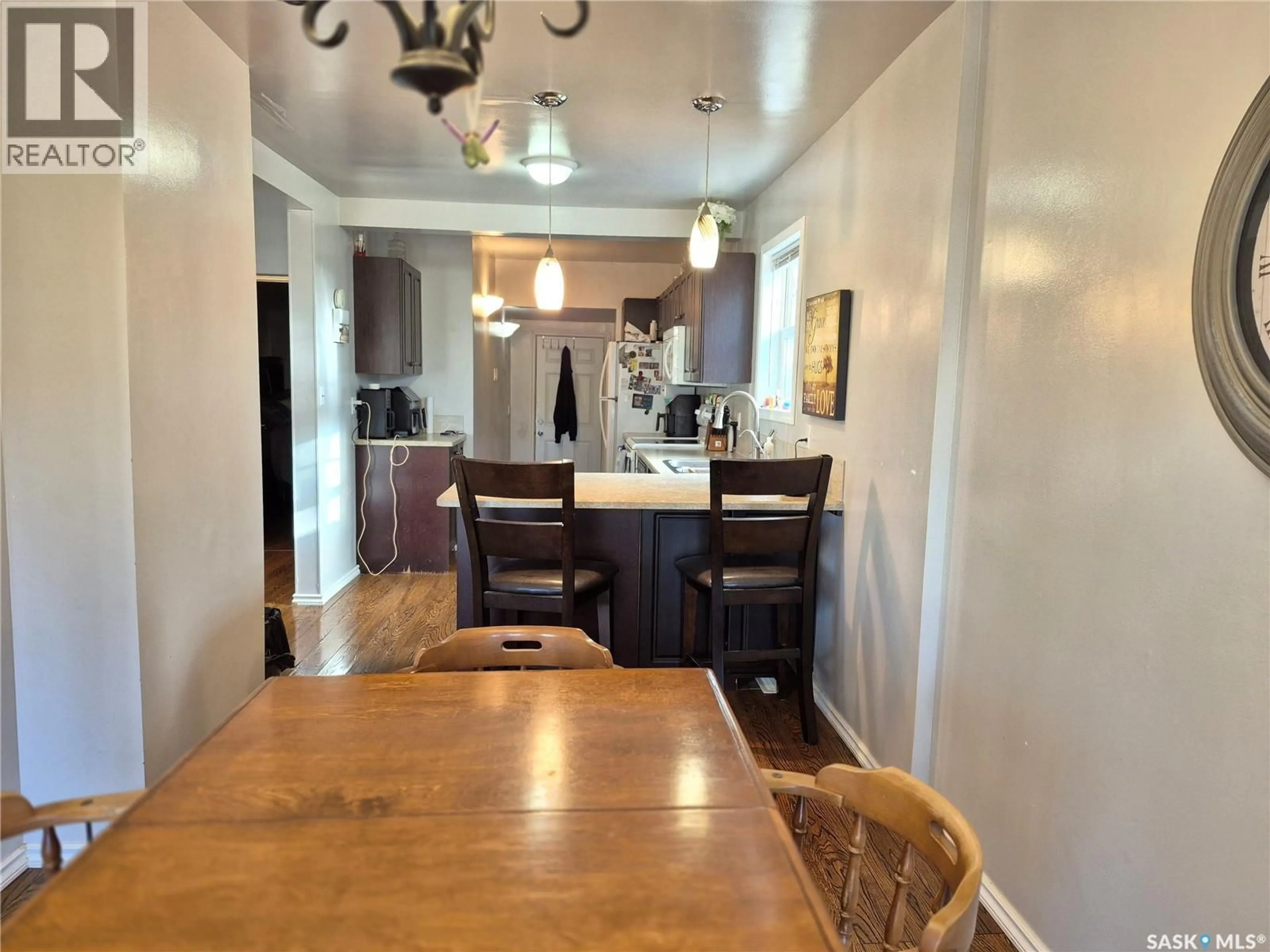 Dining room, wood/laminate floor for 515 BECKWELL AVENUE, Radville Saskatchewan S0C2G0