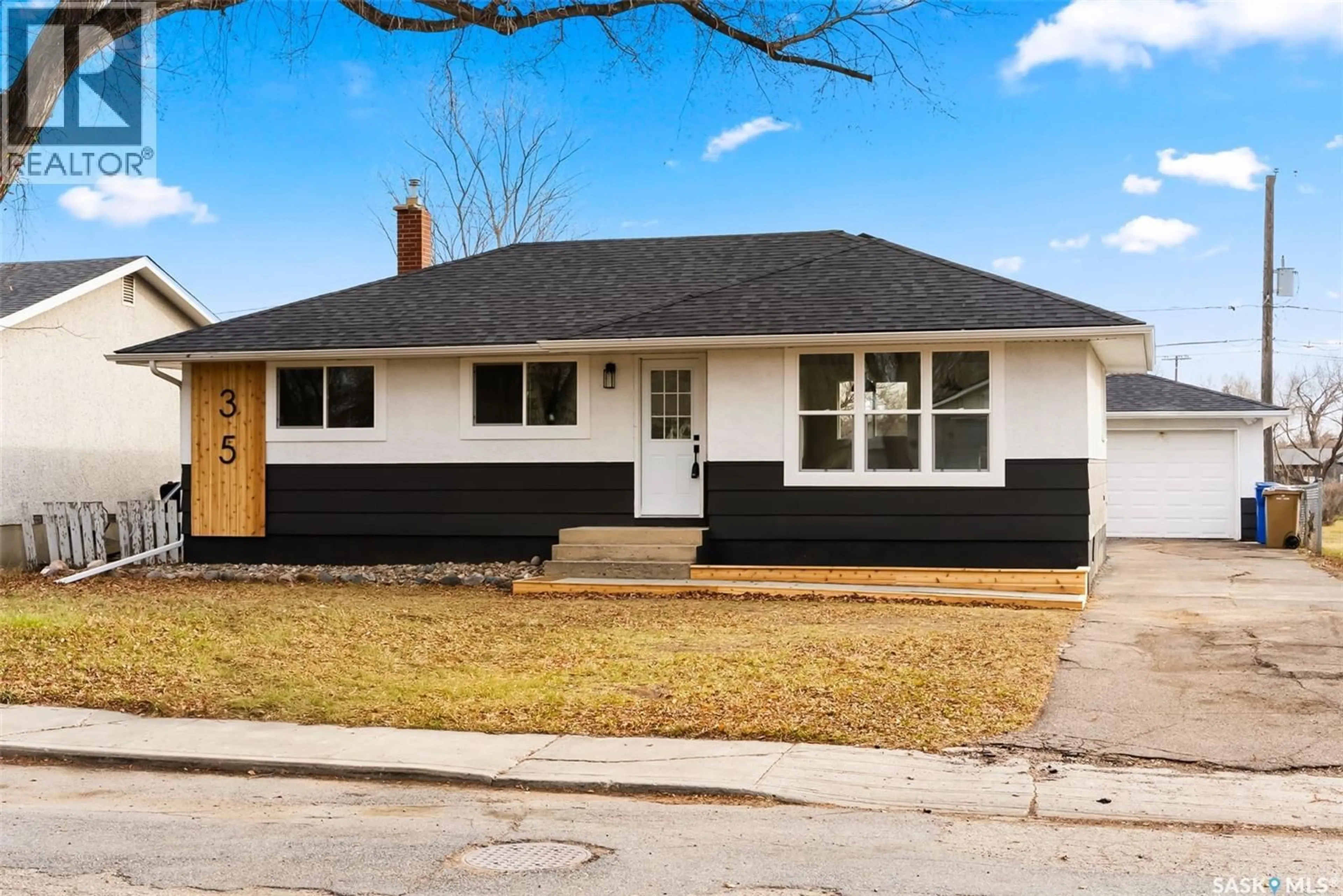 Home with vinyl exterior material, street for 35 LAIRD CRESCENT, Regina Saskatchewan S4R4N7