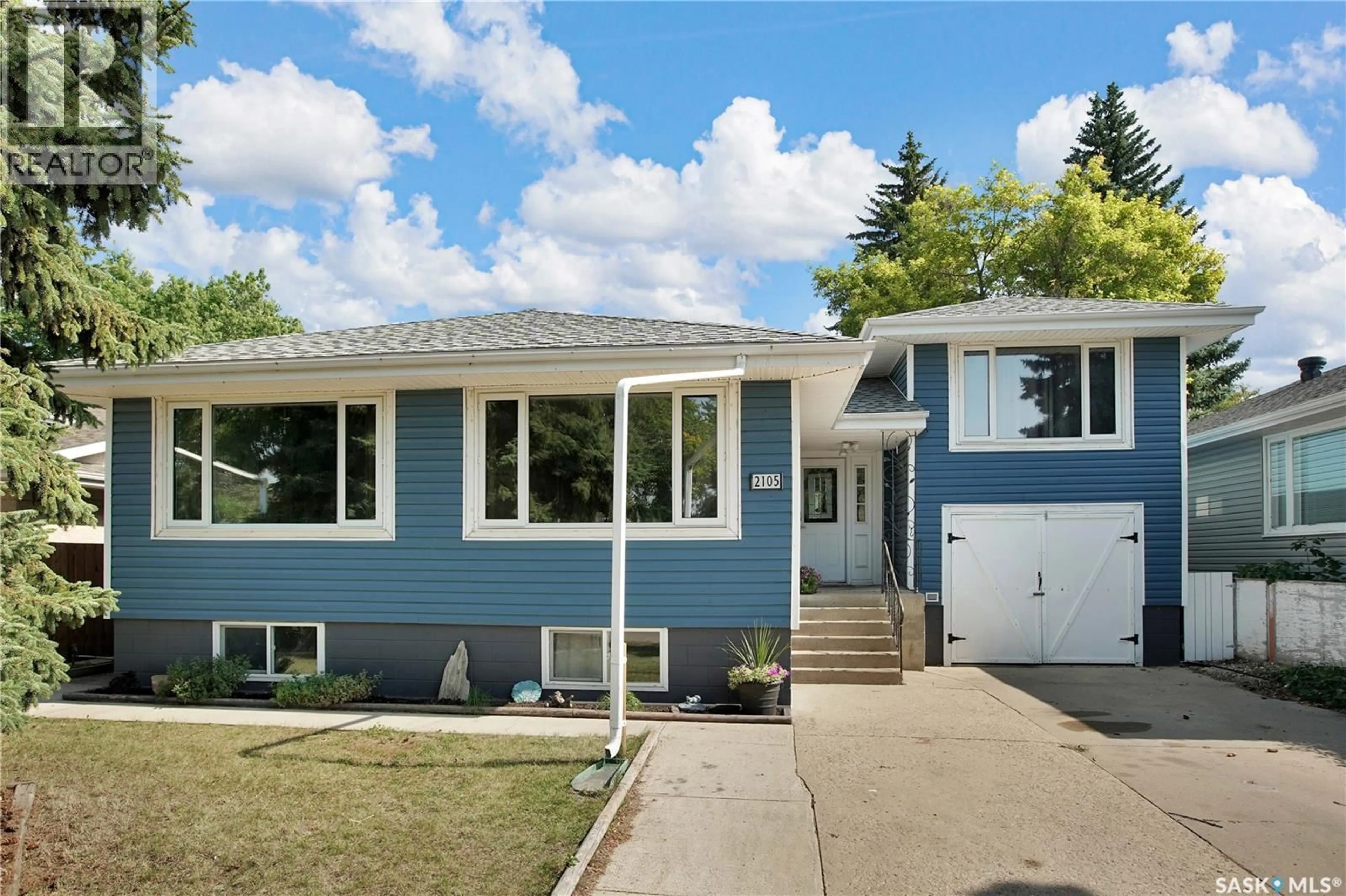 Home with vinyl exterior material, street for 2105 YORK AVENUE, Saskatoon Saskatchewan S7J1H7