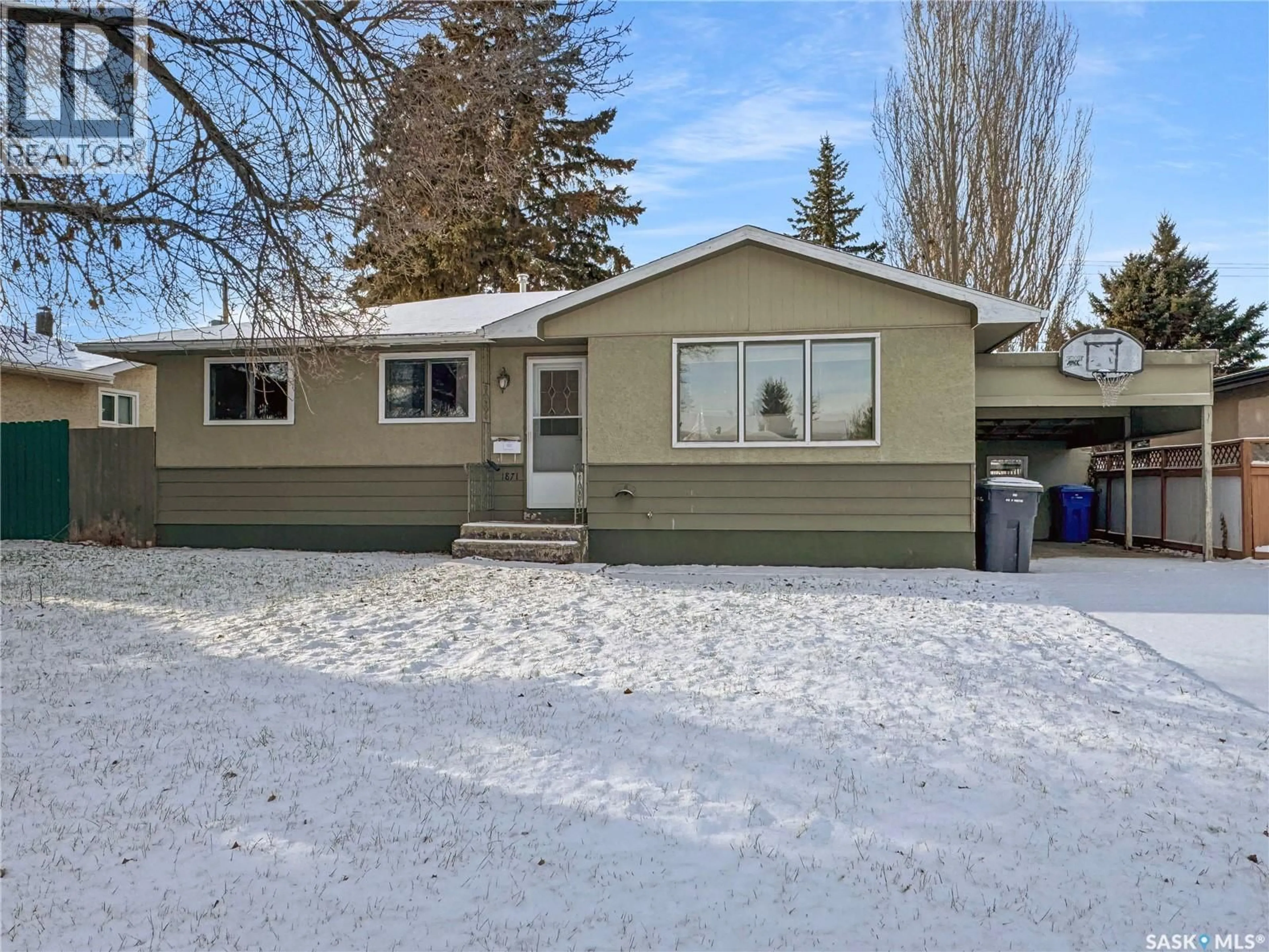 Home with vinyl exterior material, street for 1871 91ST STREET, North Battleford Saskatchewan S9A0A6