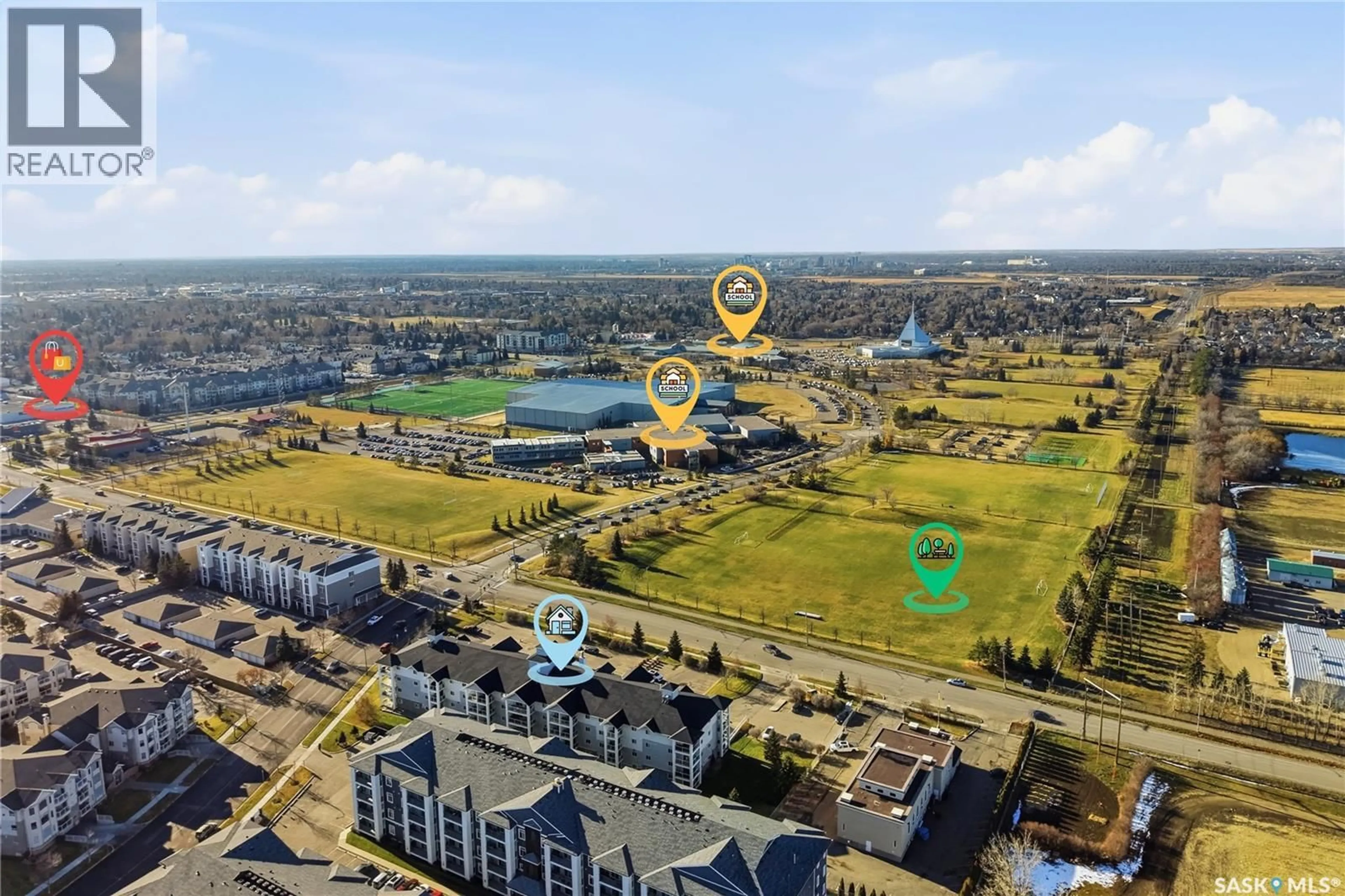 A pic from outside/outdoor area/front of a property/back of a property/a pic from drone, water/lake/river/ocean view for 303 LOWE ROAD, Saskatoon Saskatchewan S7S1P2