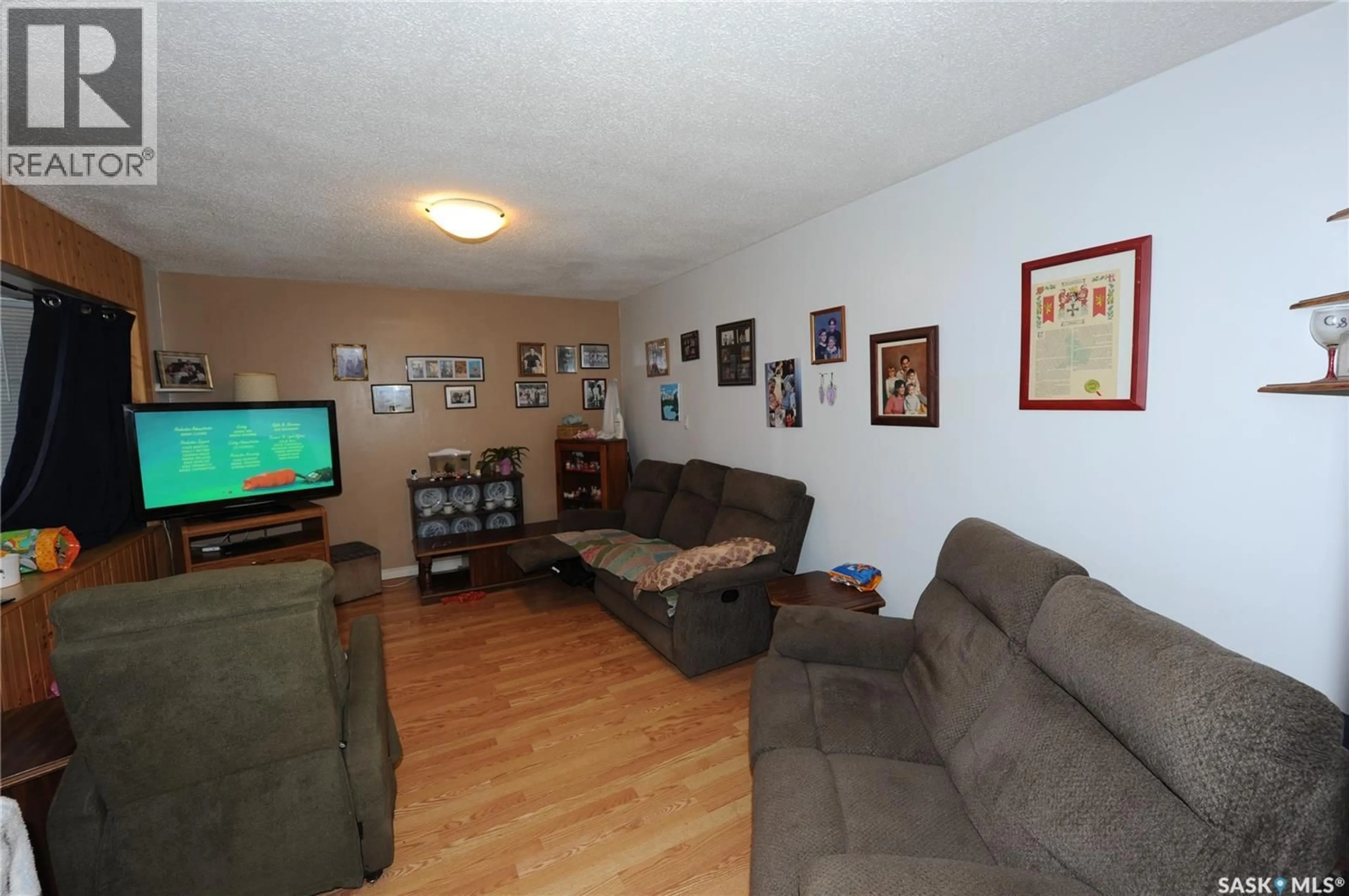 Living room with furniture, unknown for 213 1ST STREET, Dundurn Saskatchewan S0K1K0