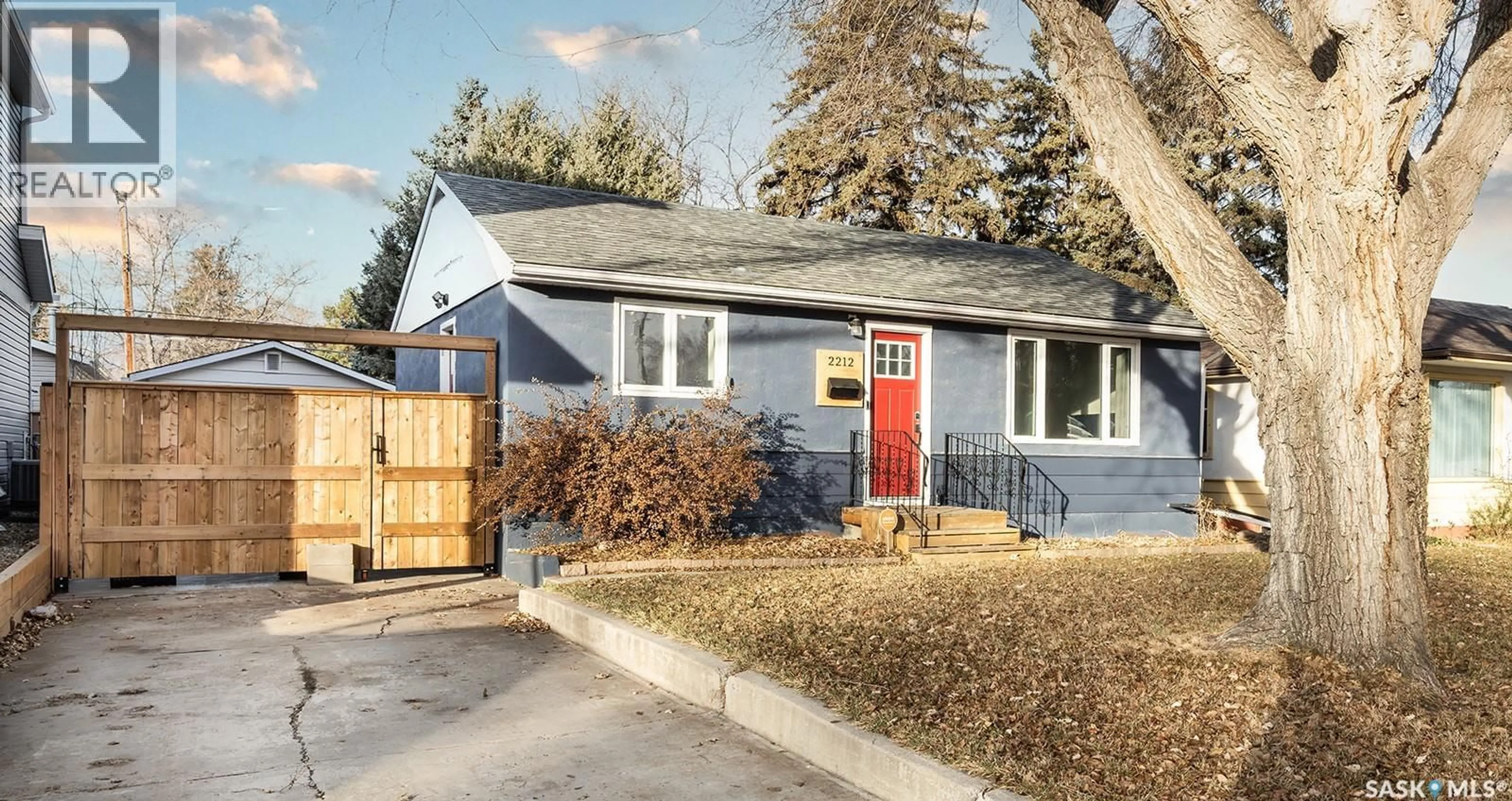Home with vinyl exterior material, street for 2212 YORK AVENUE, Saskatoon Saskatchewan S7J1J1