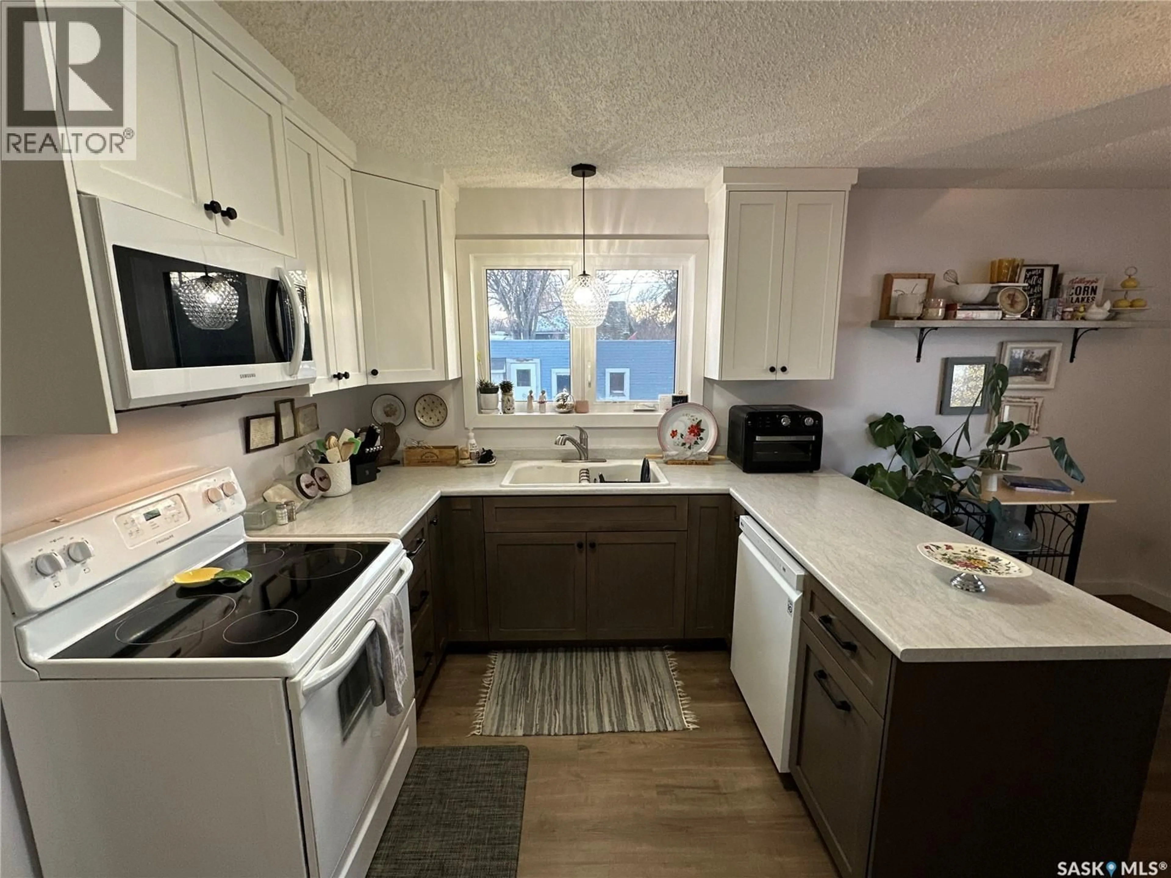 Open concept kitchen, unknown for 1019 8TH STREET, Rosthern Saskatchewan S0K3R0