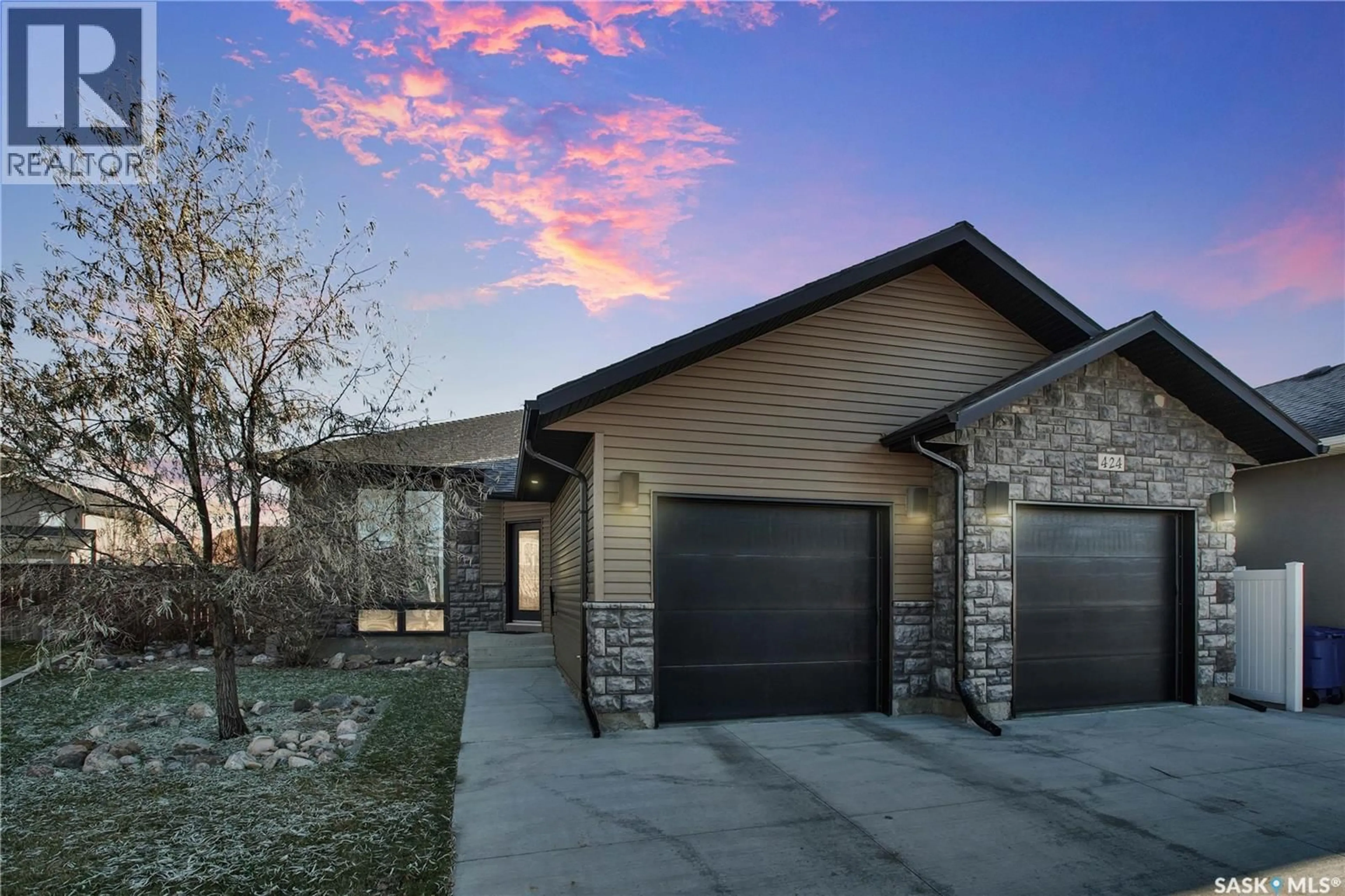 Home with brick exterior material, street for 424 LYLE CRESCENT, Warman Saskatchewan S0K4S1