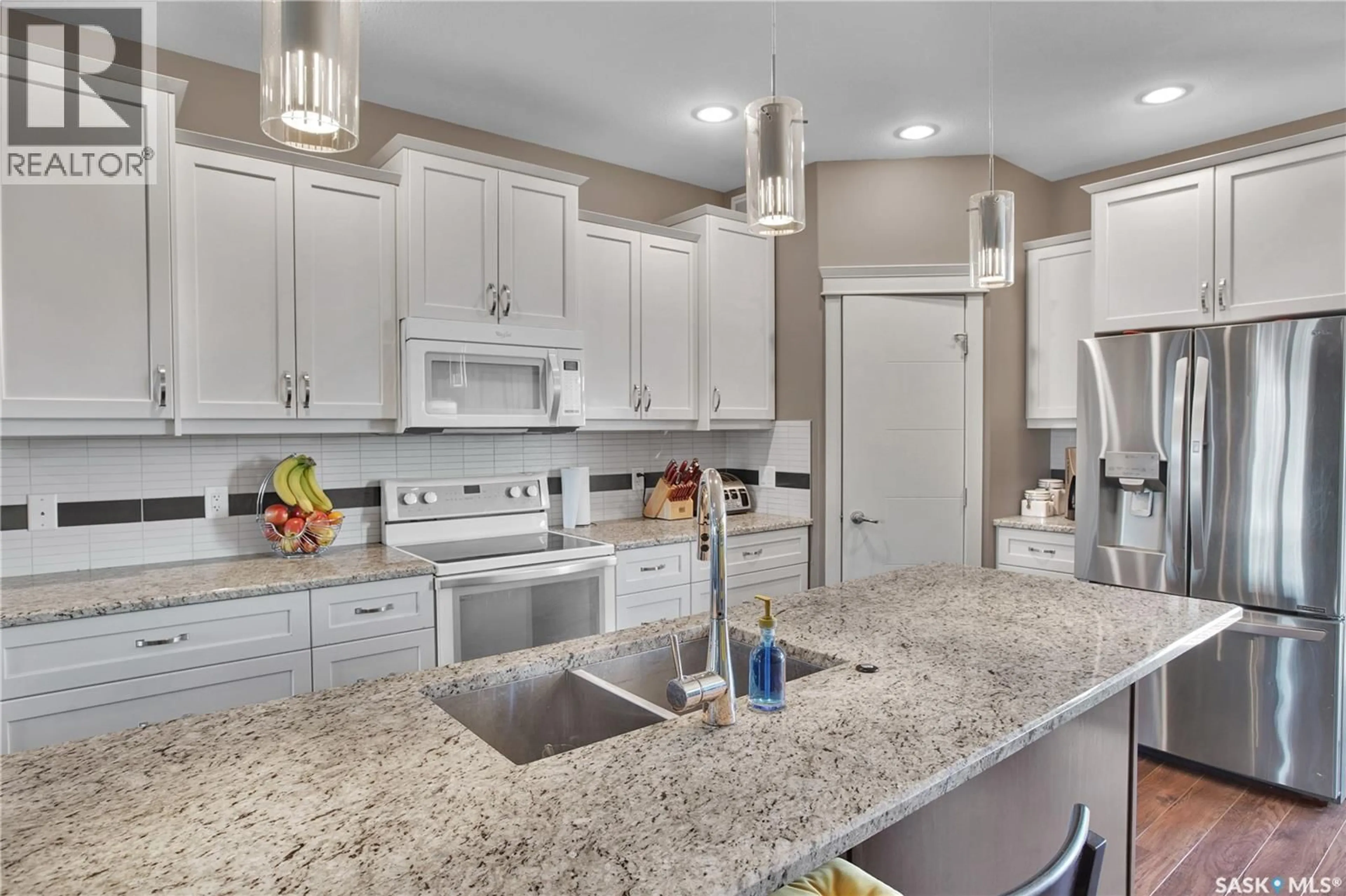 Open concept kitchen, ceramic/tile floor for 424 LYLE CRESCENT, Warman Saskatchewan S0K4S1