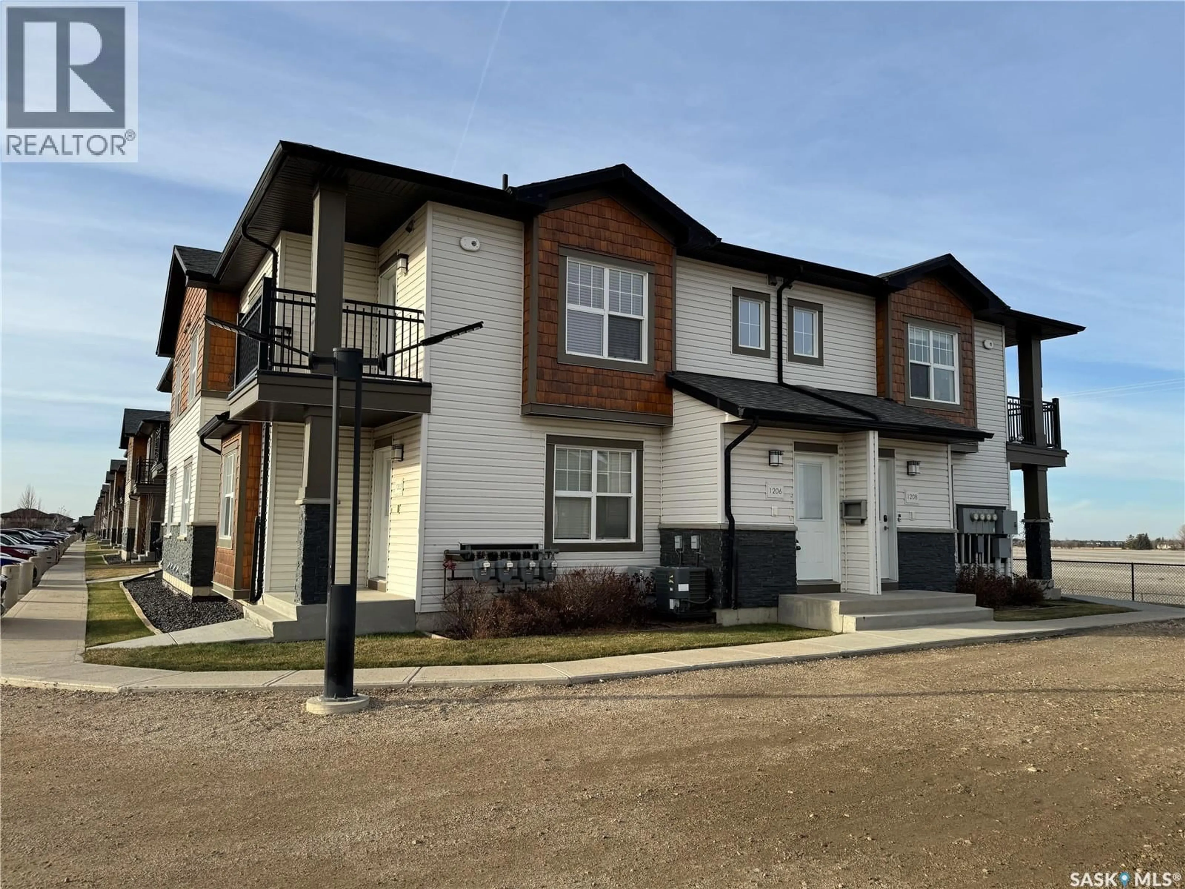 Home with vinyl exterior material, street for 1015 - 1206 PATRICK CRESCENT, Saskatoon Saskatchewan S7W0M5