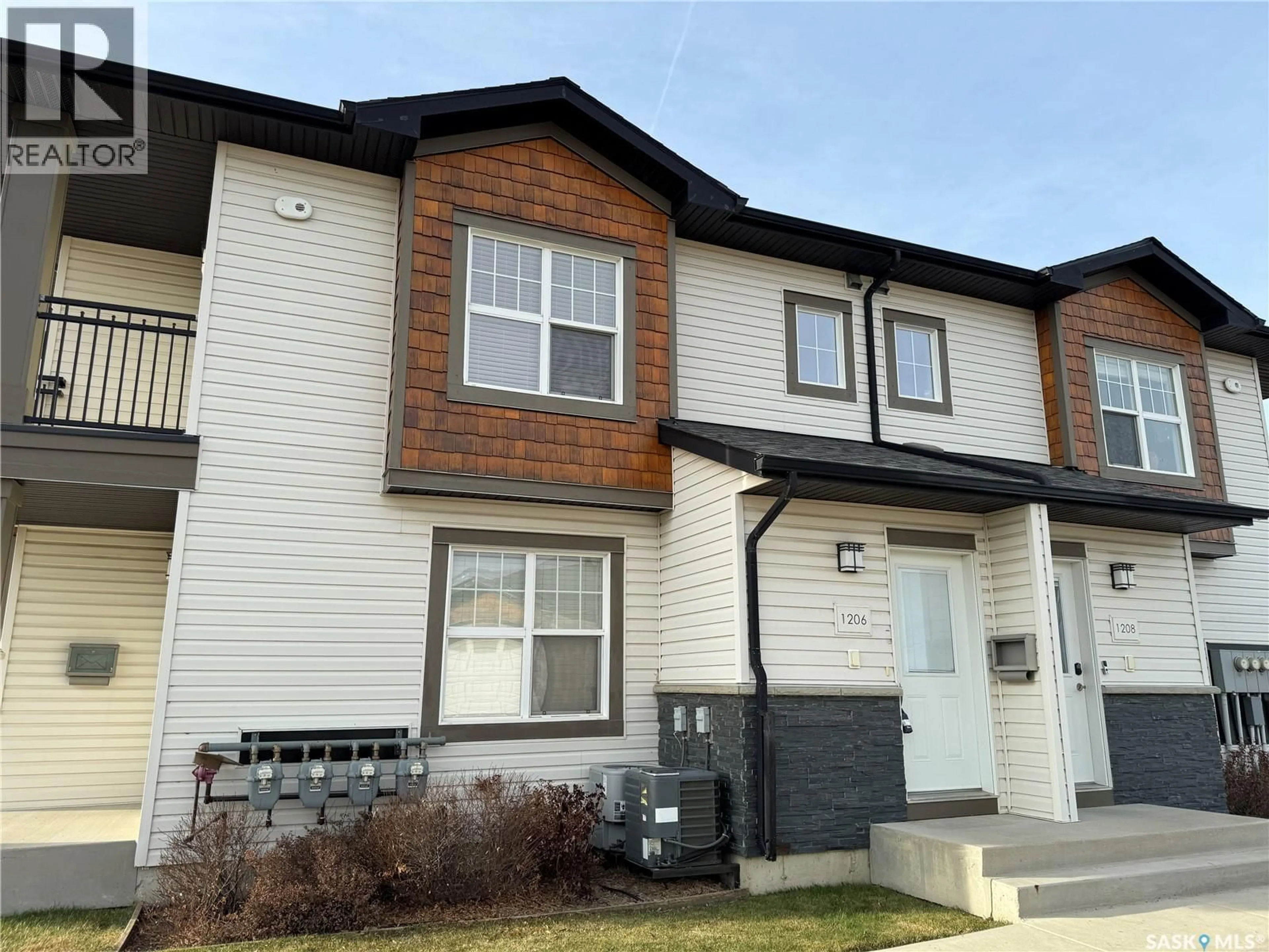 Home with vinyl exterior material, street for 1015 - 1206 PATRICK CRESCENT, Saskatoon Saskatchewan S7W0M5