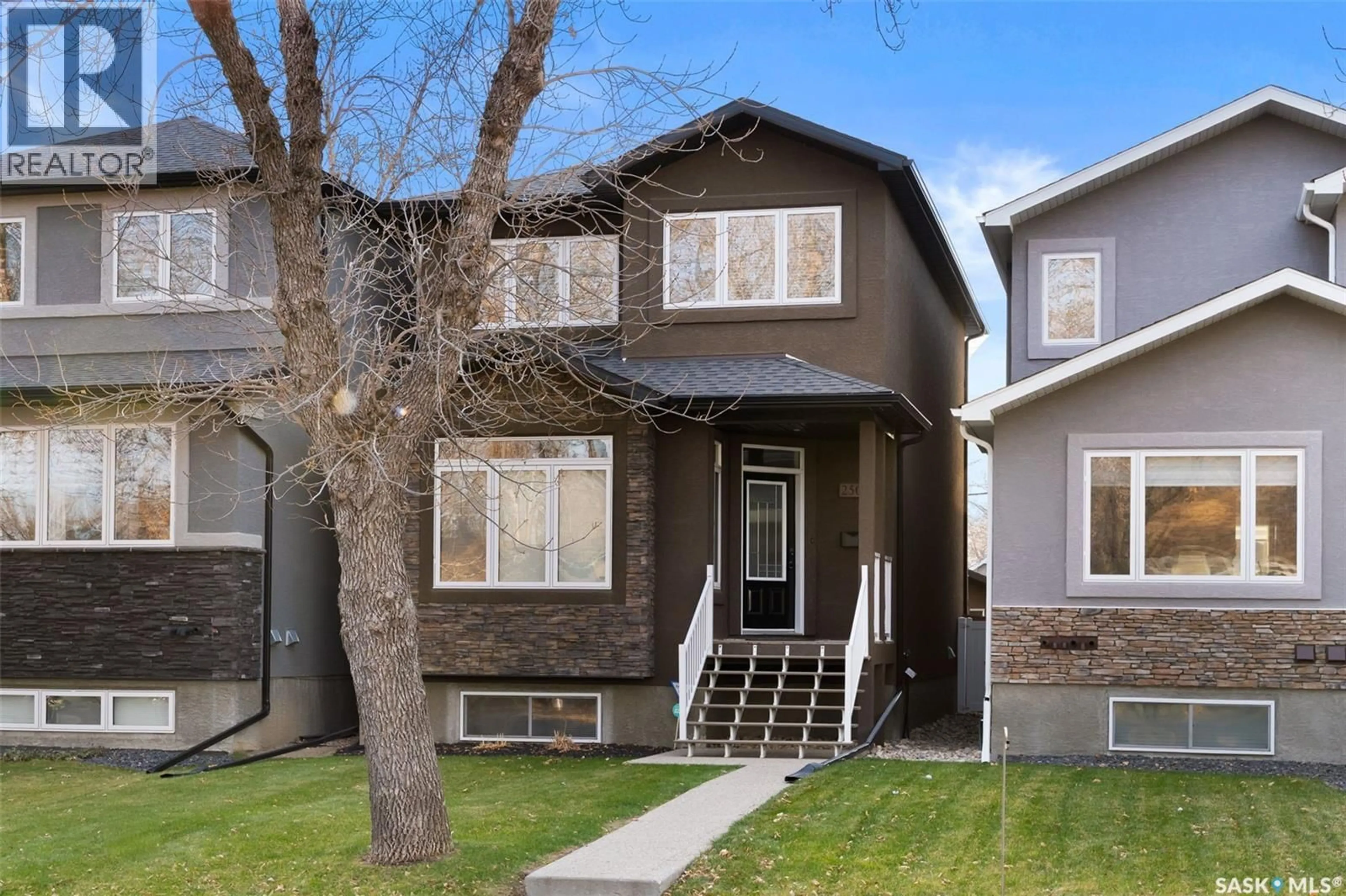 Home with vinyl exterior material, street for 2508 MCARA STREET, Regina Saskatchewan S4N2W7