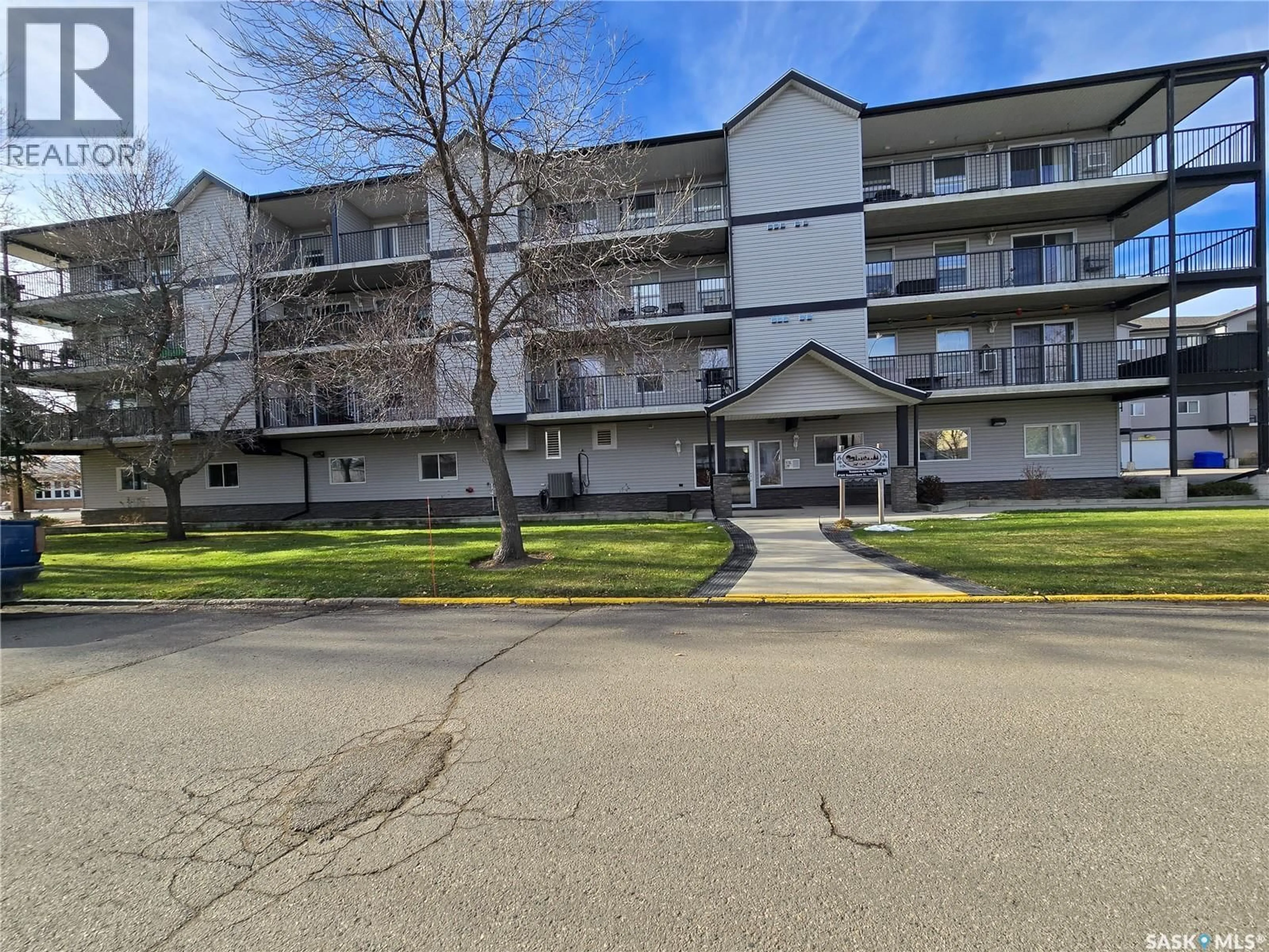 A pic from outside/outdoor area/front of a property/back of a property/a pic from drone, street for 505 - 407 BANNERMAN STREET, Weyburn Saskatchewan S4H1V5