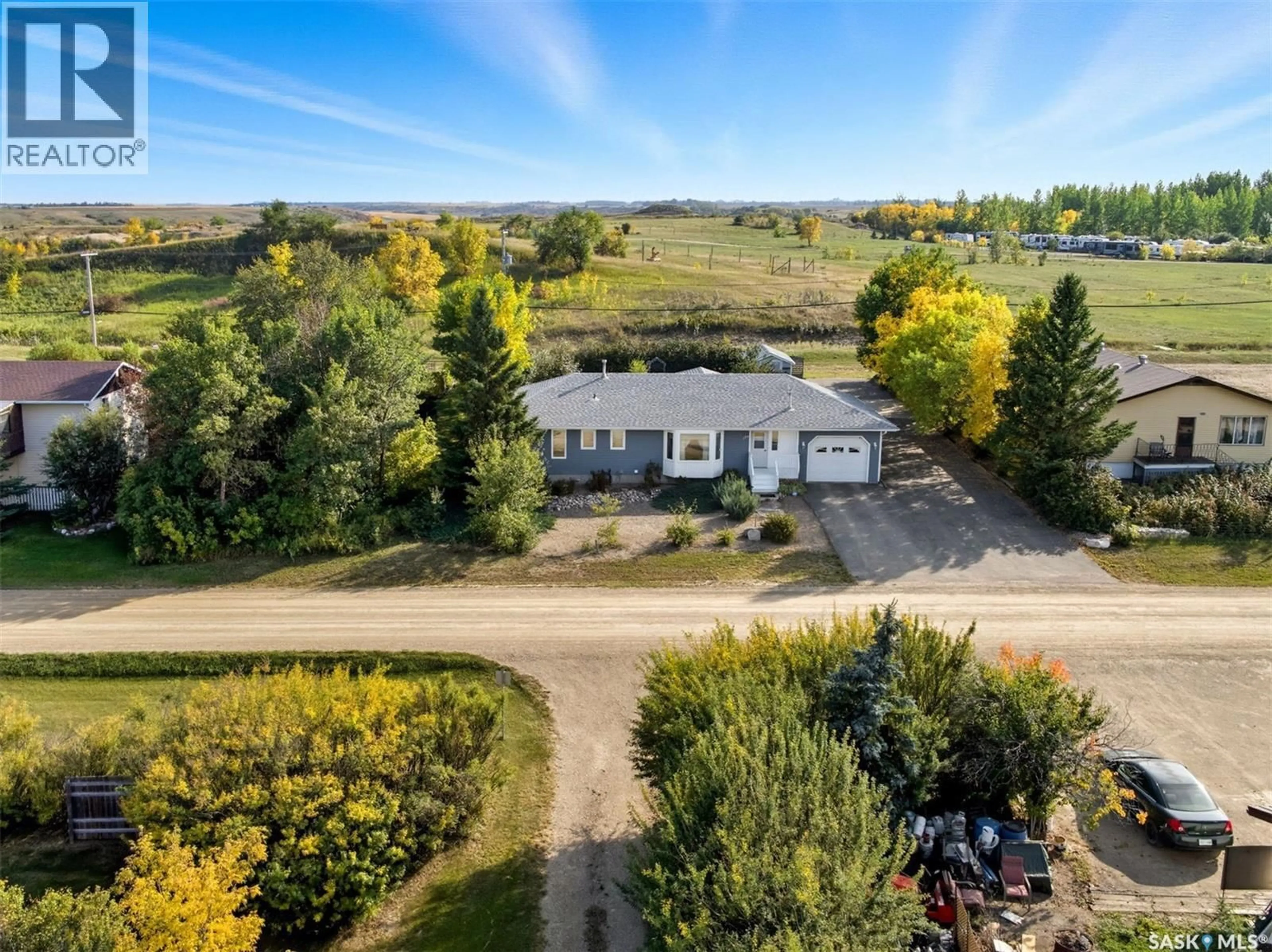 A pic from outside/outdoor area/front of a property/back of a property/a pic from drone, unknown for 104-108 LAKEVIEW AVENUE, Manitou Beach Saskatchewan S0K4T1