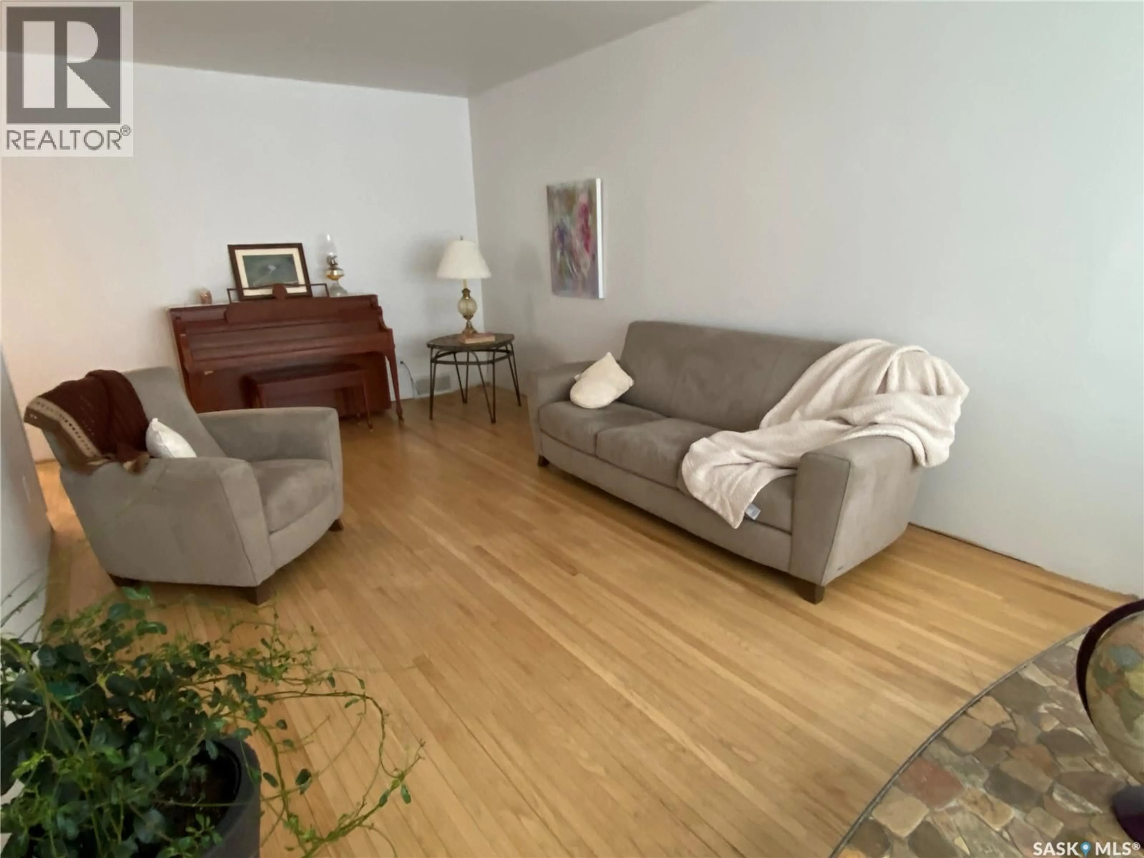 Living room with furniture, unknown for HYDAMACHA ACREAGE, Orkney Rm No. 244 Saskatchewan S3N3L8