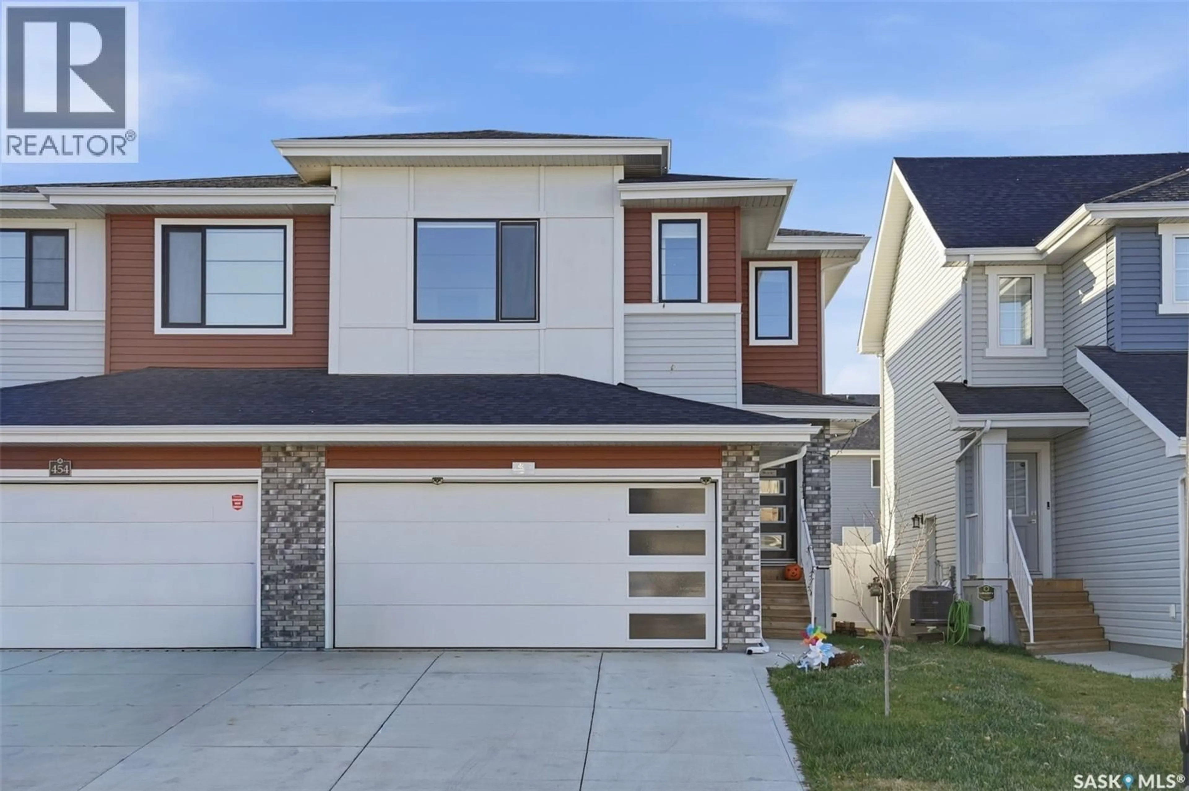 Home with vinyl exterior material, street for 458 SCHMEISER BEND, Saskatoon Saskatchewan S7V1N6