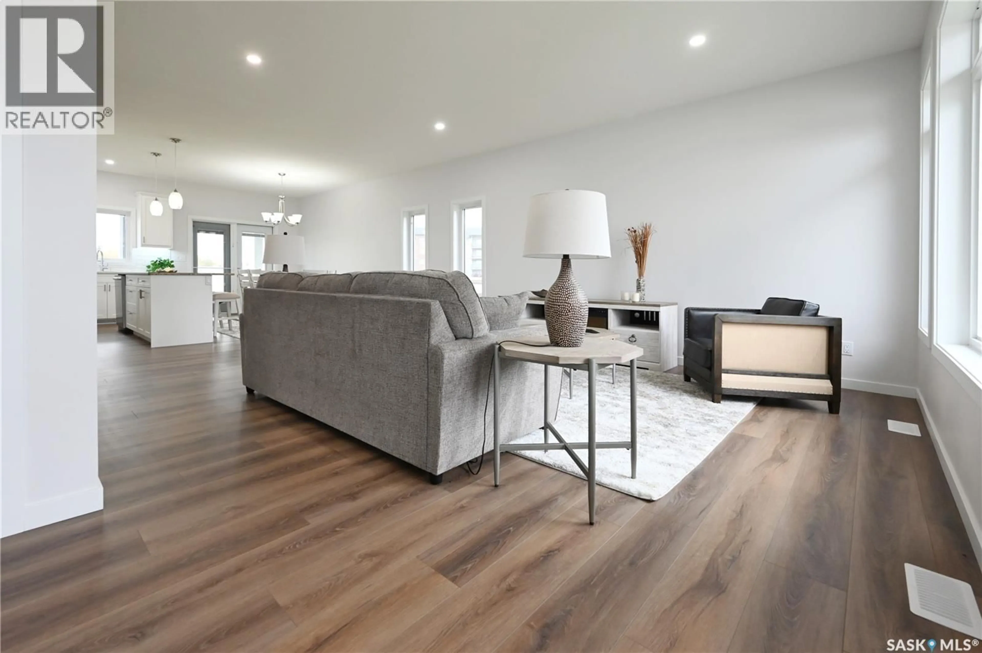 Living room with furniture, wood/laminate floor for 3 - 2330 MORSKY DRIVE, Estevan Saskatchewan S4A3A5