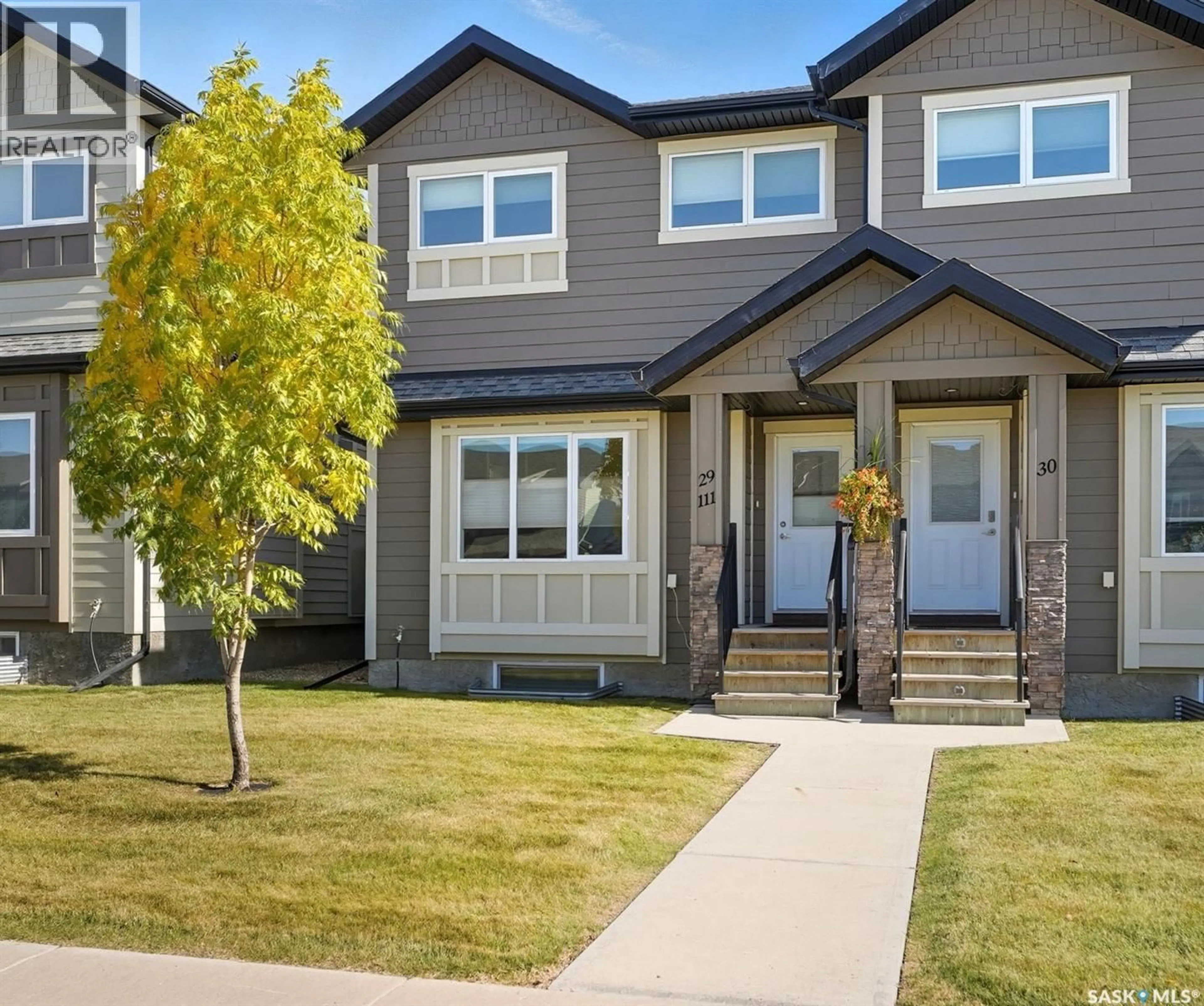 Home with vinyl exterior material, street for 29 111 ROSEWOOD GATE N, Saskatoon Saskatchewan S7V0E5
