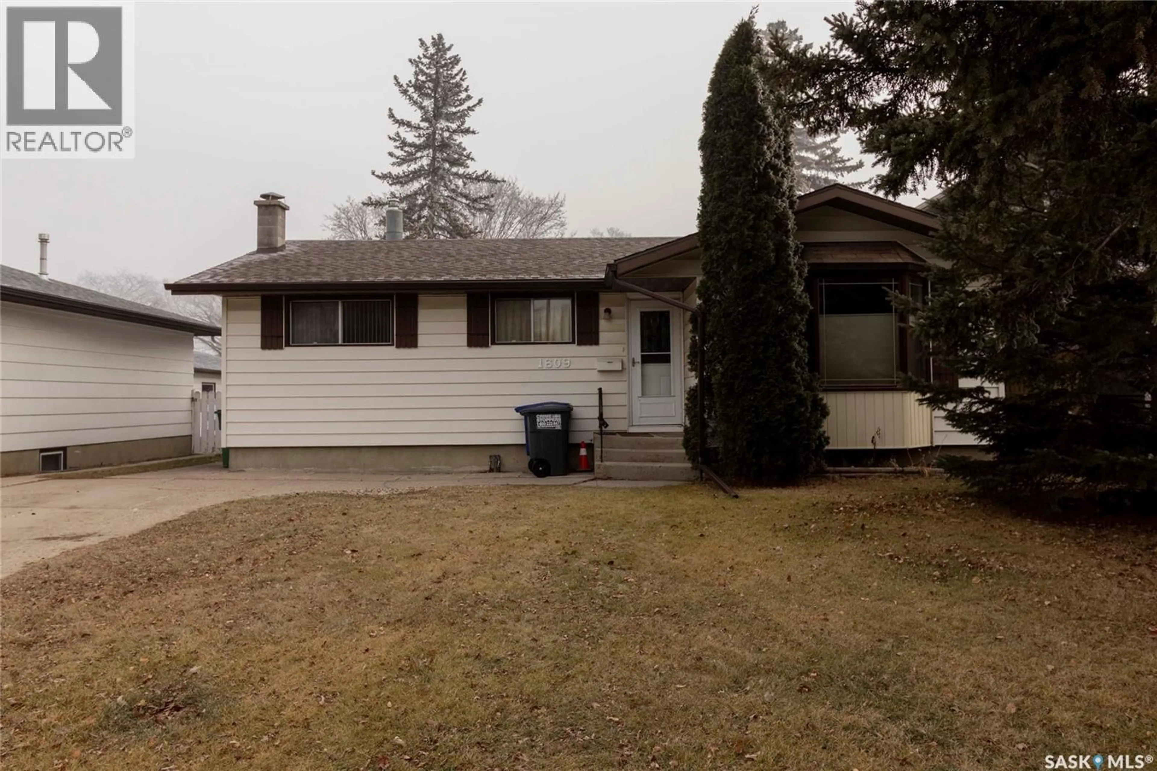 Home with vinyl exterior material, street for 1609 ARGYLE AVENUE, Saskatoon Saskatchewan S7H2W6
