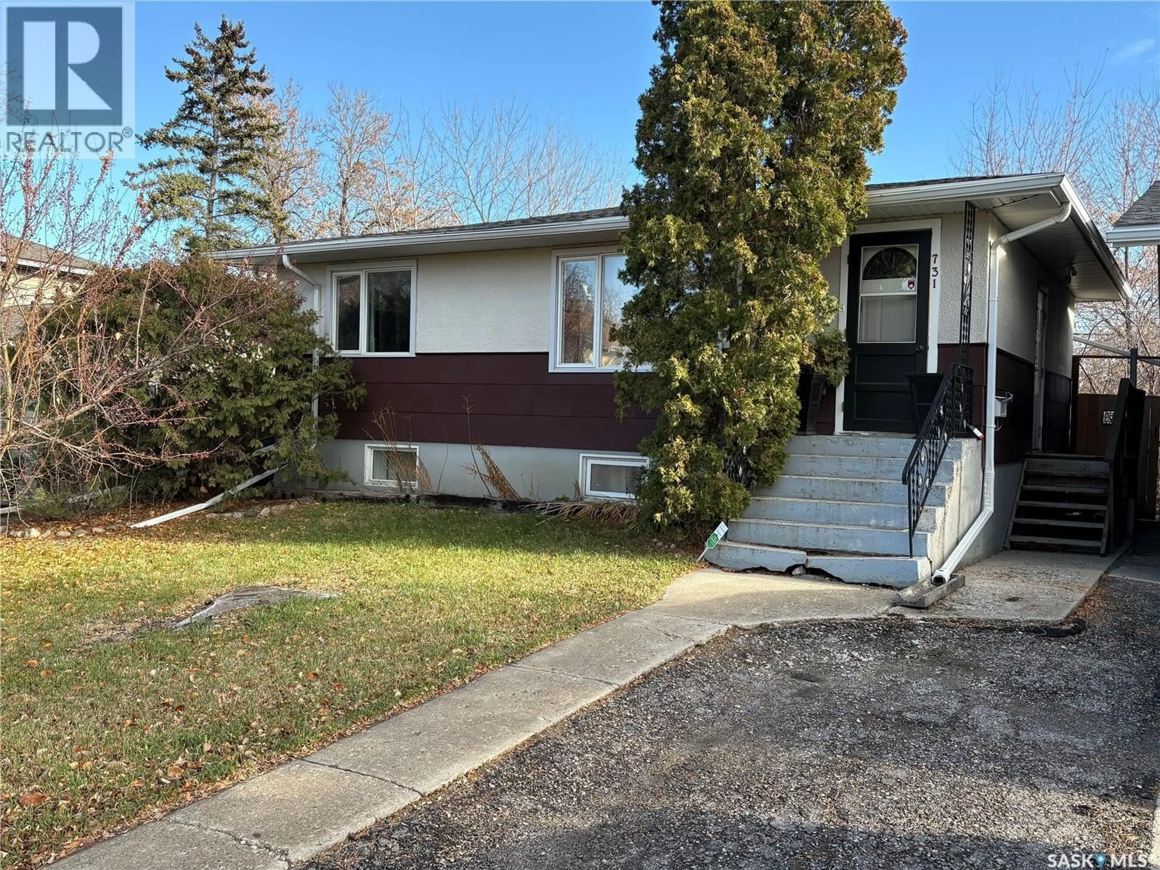 Home with vinyl exterior material, street for 731 RETALLACK STREET, Regina Saskatchewan S4T2G7