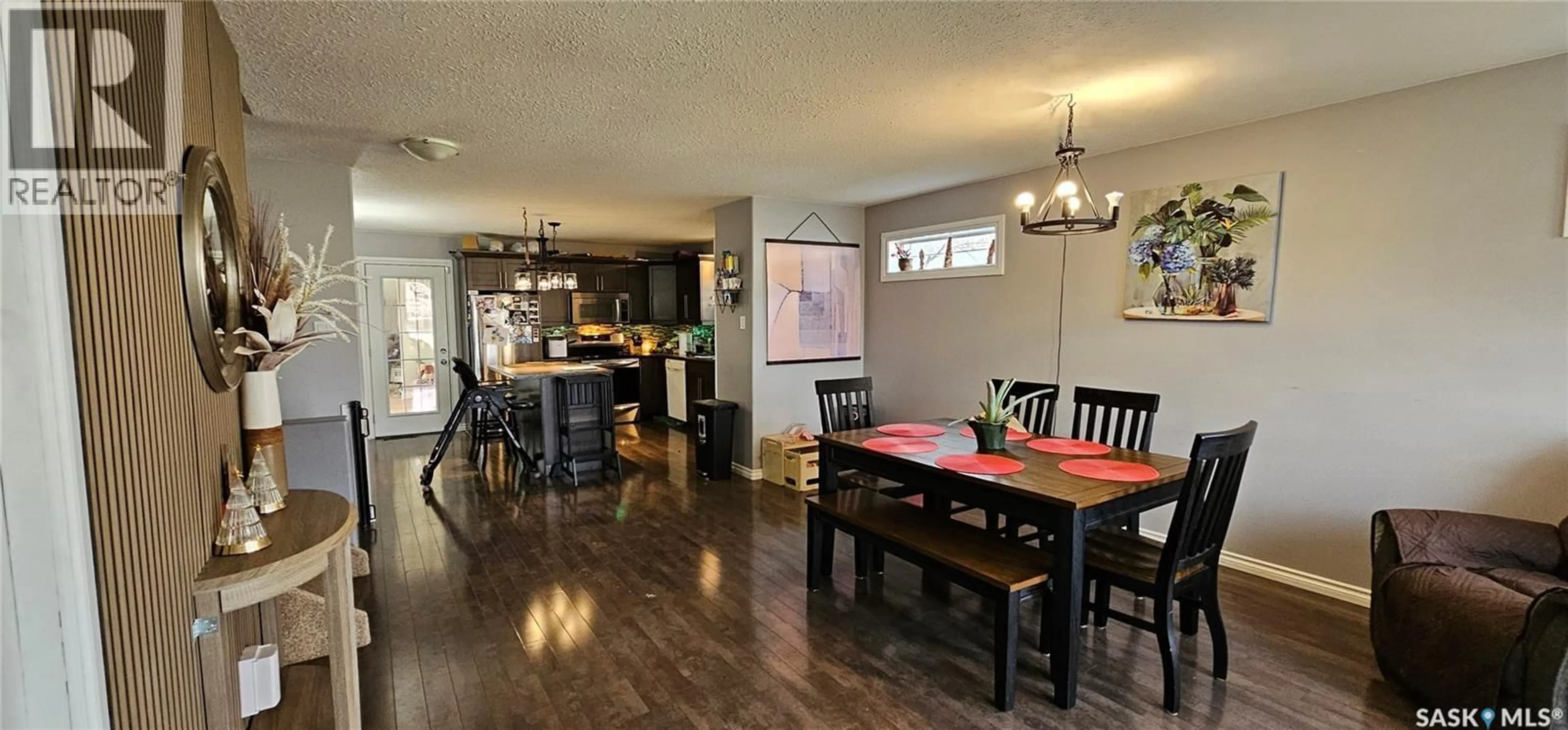Dining room, wood/laminate floor for 914 108TH AVENUE, Tisdale Saskatchewan S0E1T0