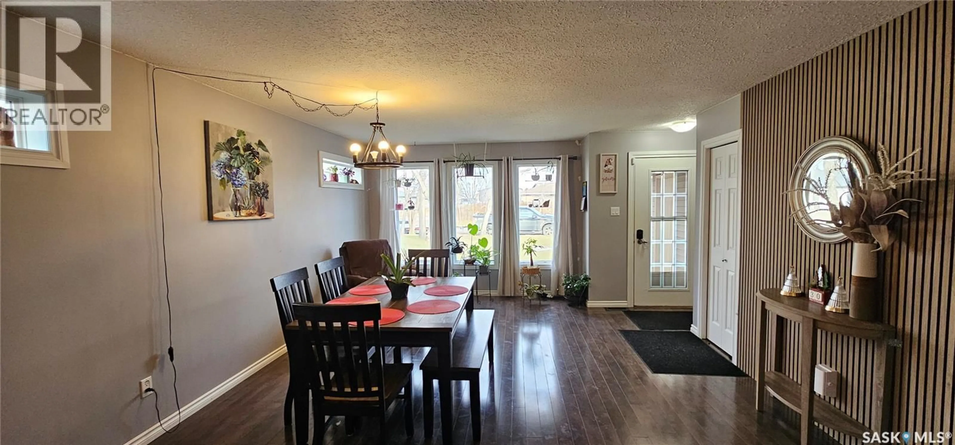 Dining room, wood/laminate floor for 914 108TH AVENUE, Tisdale Saskatchewan S0E1T0