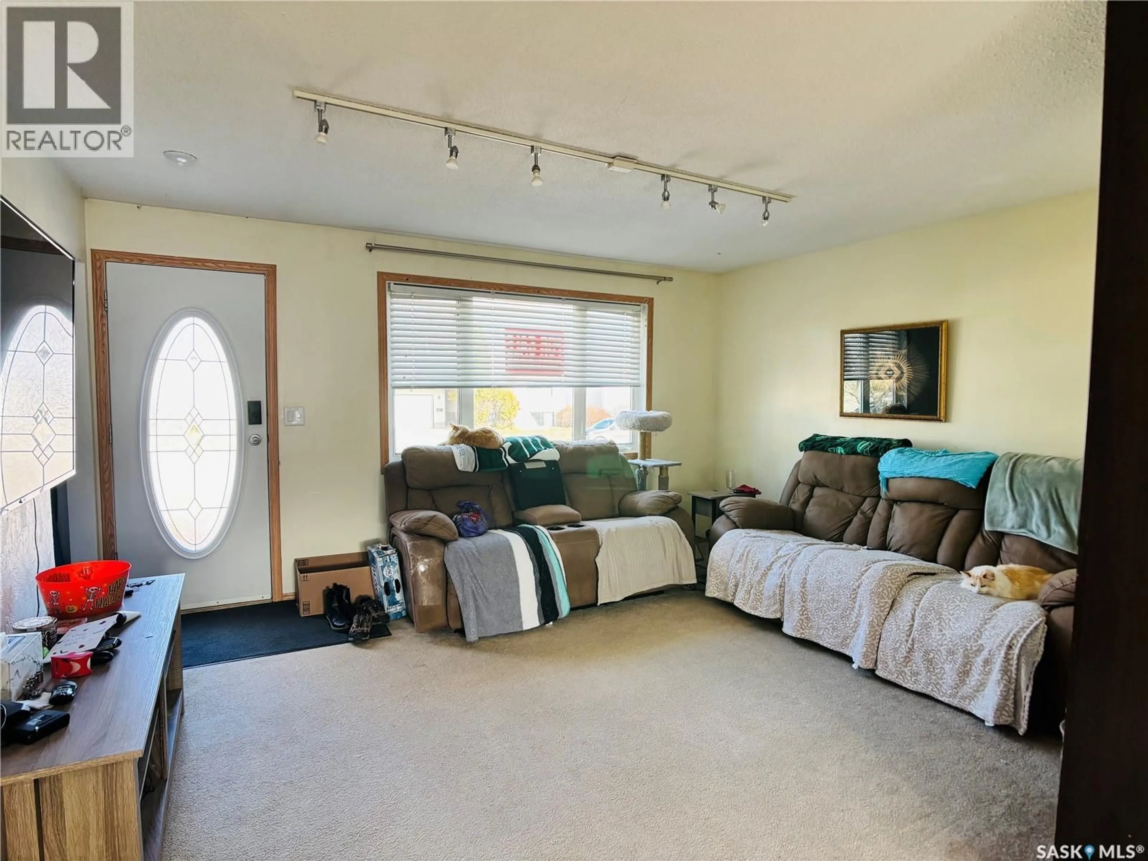 Living room with furniture, unknown for 530 FIRST STREET, Estevan Saskatchewan S4A0E8