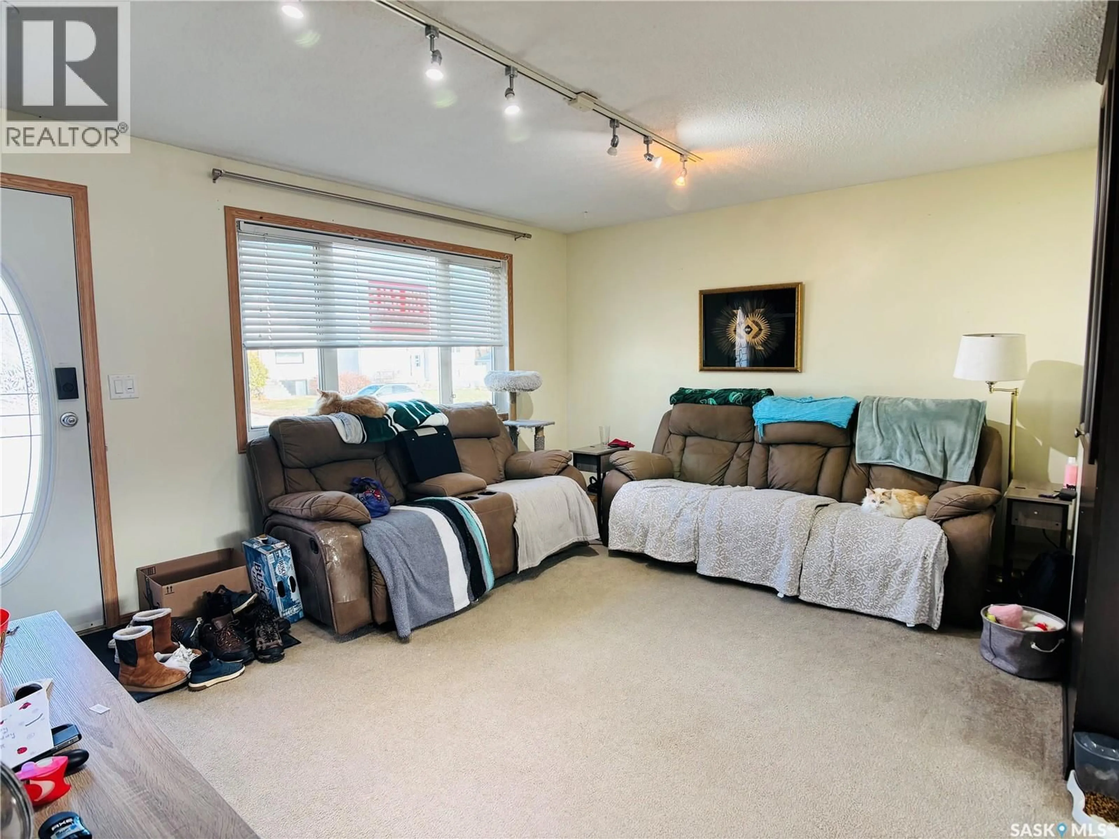 Living room with furniture, unknown for 530 FIRST STREET, Estevan Saskatchewan S4A0E8