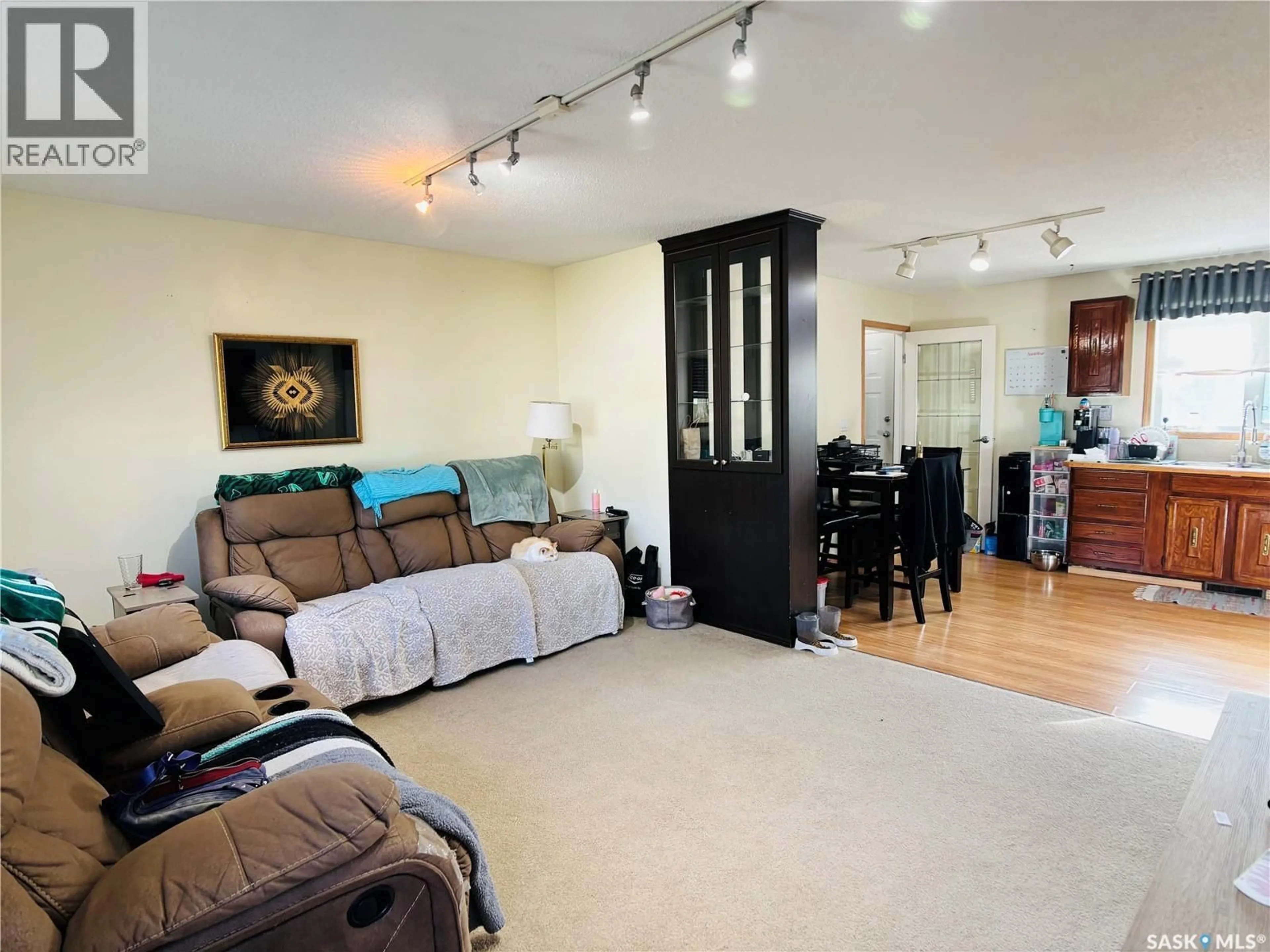 Living room with furniture, unknown for 530 FIRST STREET, Estevan Saskatchewan S4A0E8