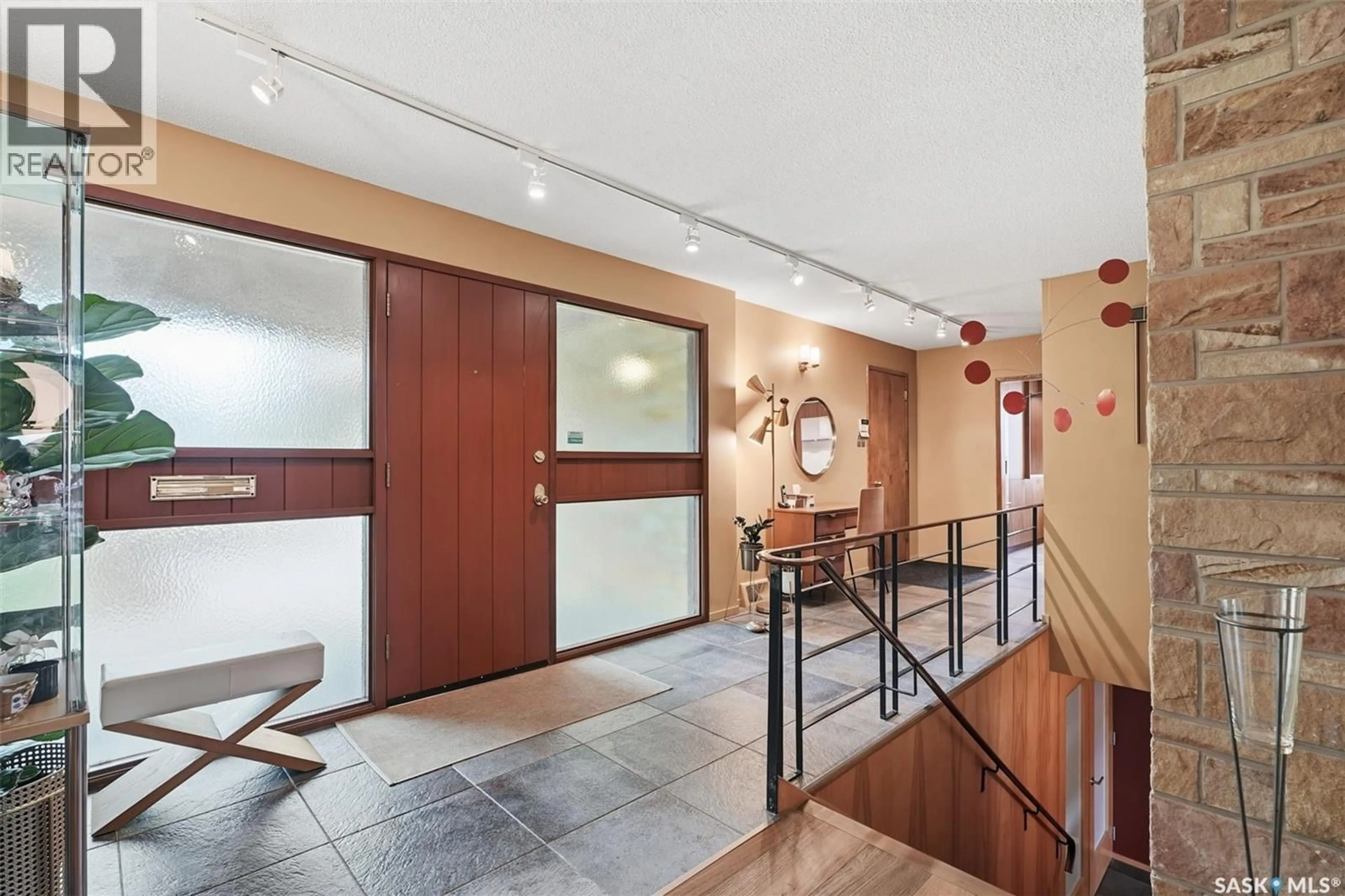 Indoor foyer for 97 RED RIVER ROAD, Saskatoon Saskatchewan S7K1G4