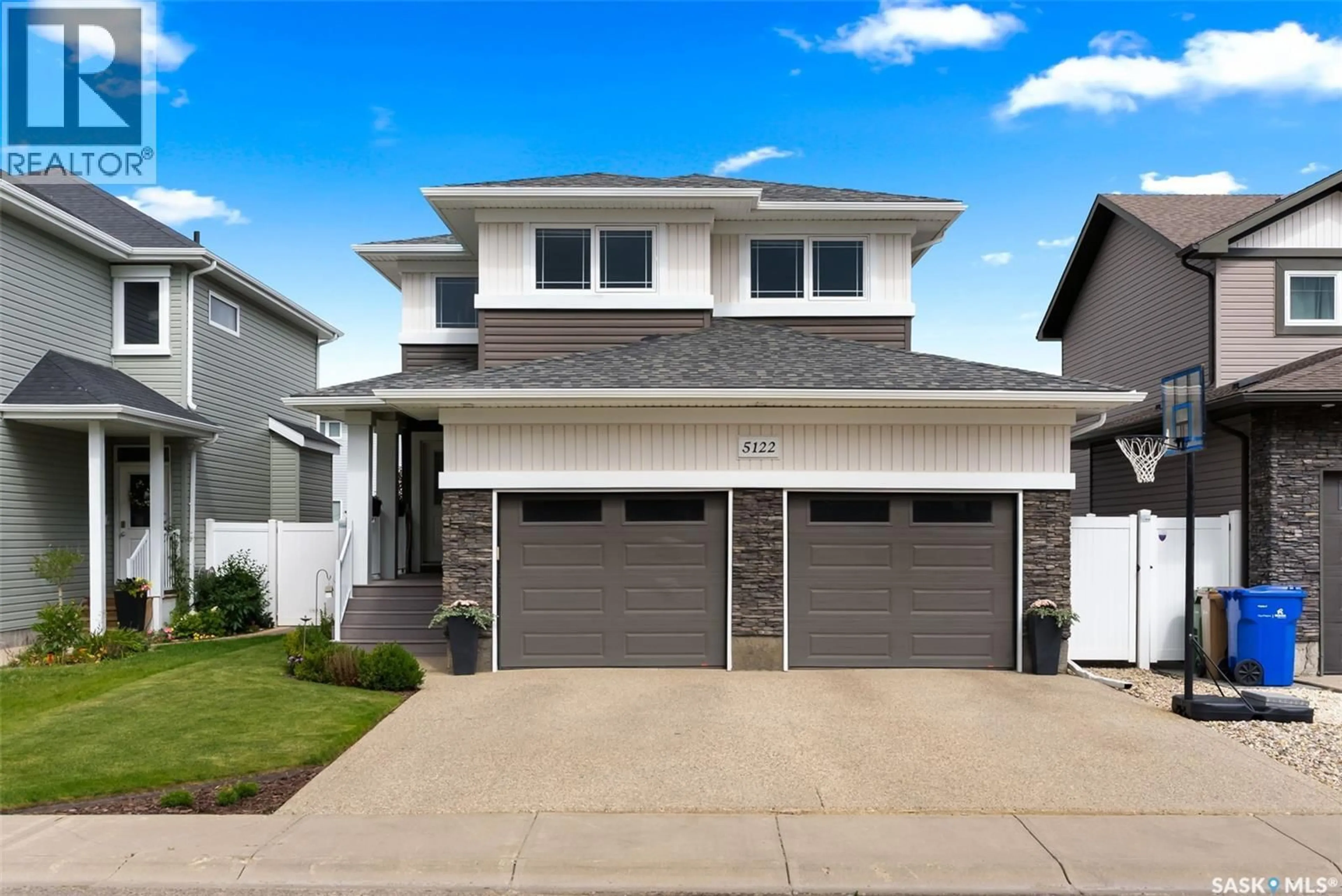 Home with vinyl exterior material, street for 5122 SNOWBIRDS CRESCENT, Regina Saskatchewan S4W0H4